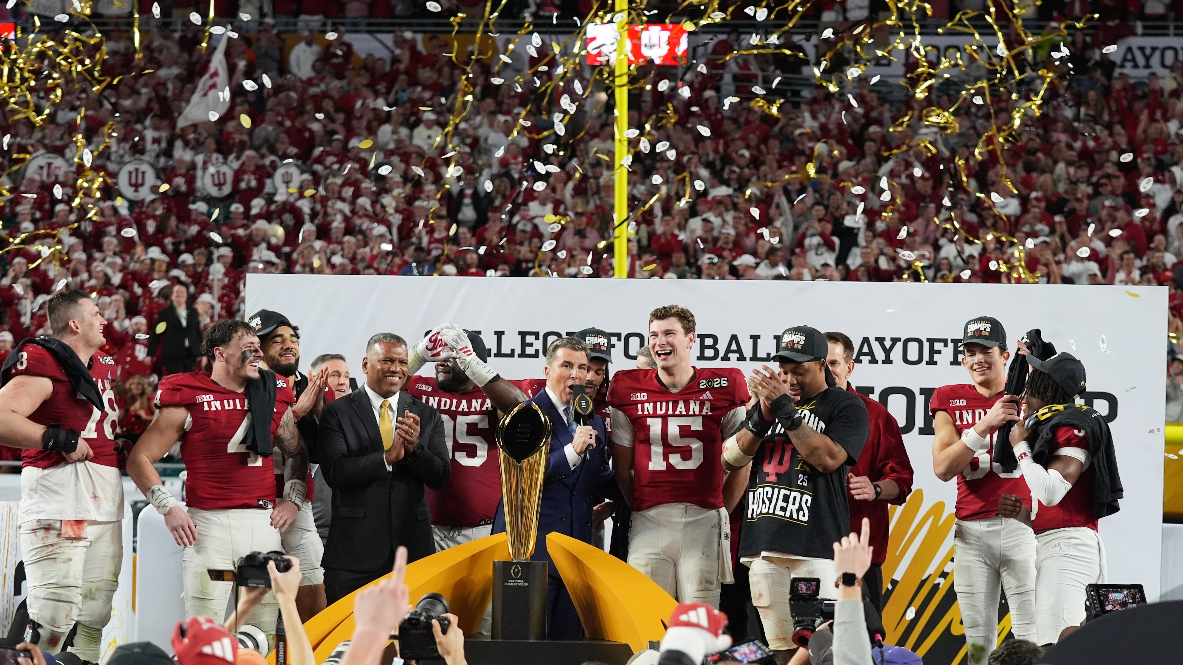 FILE - Indiana quarterback Fernando Mendoza (15) is interviewed during the trophy ceremony after Indiana defeated Miami in a College Football Playoff national championship game, Monday, Jan. 19, 2026, in Miami Gardens, Fla. (AP Photo/Lynne Sladky,File)