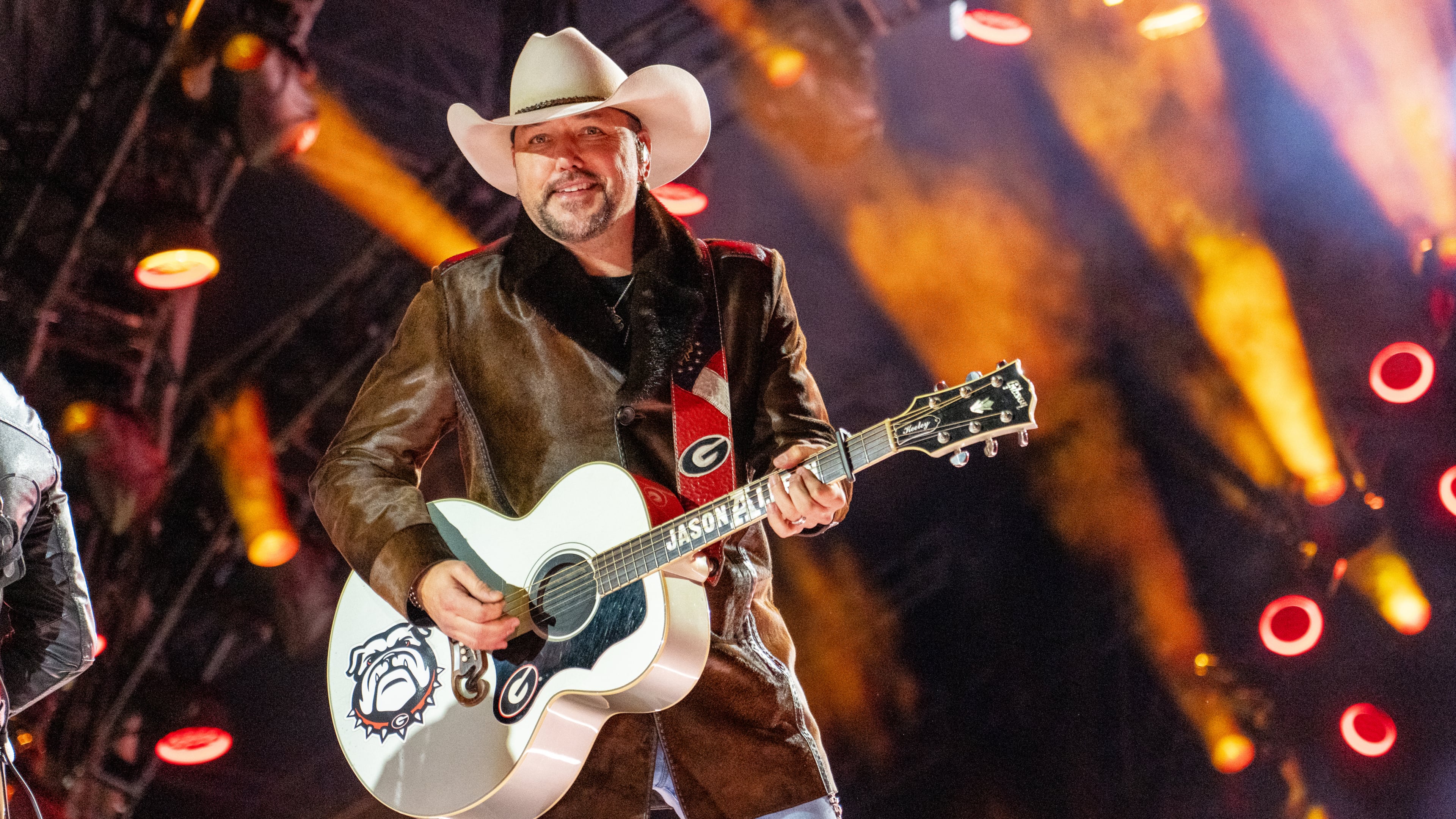 Jason Aldean performs in Nashville in December. On Saturday, he'll perform with Luke Bryan at Sanford Stadium in Athens. (Amy Harris/Invision/AP)