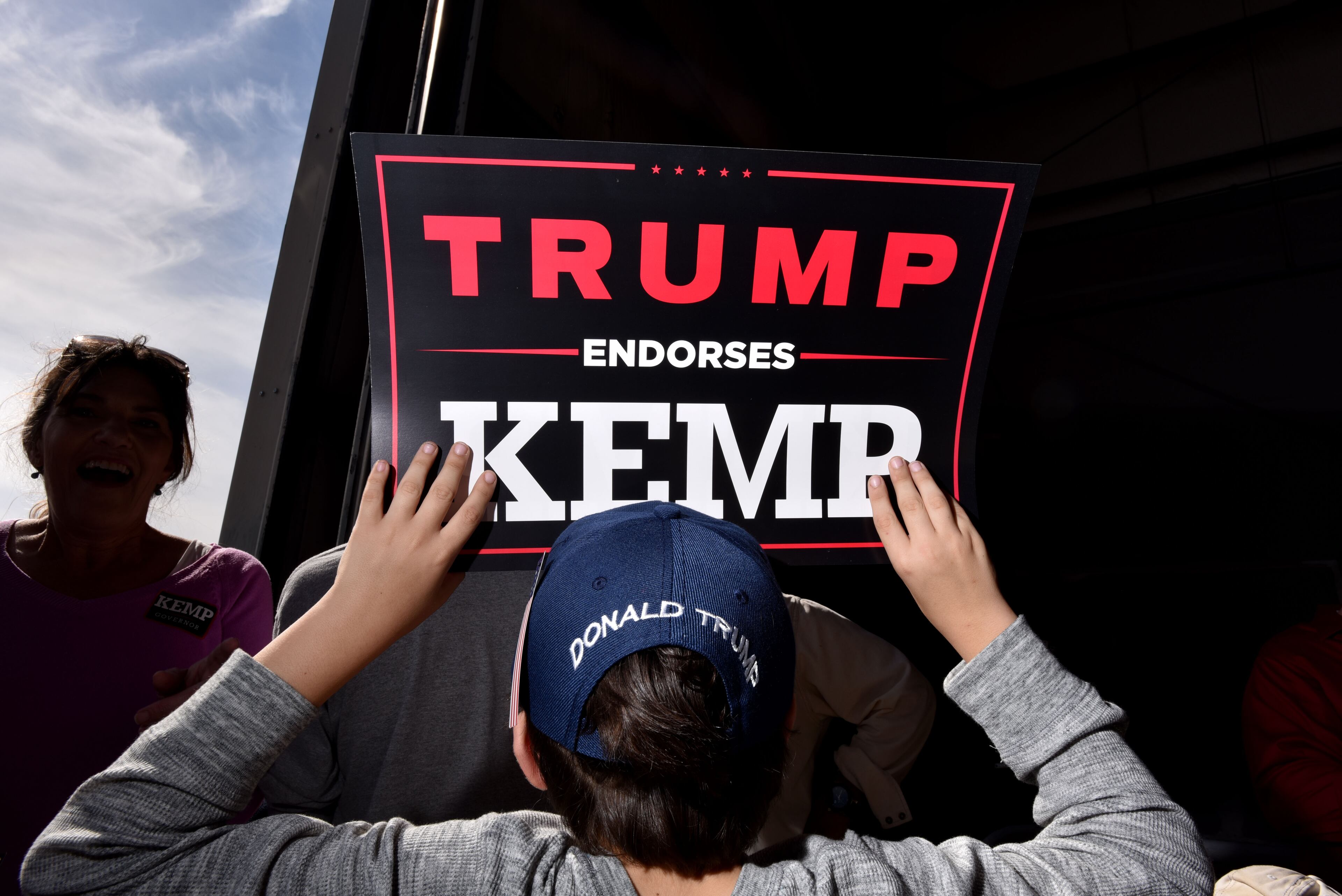 November 4, 2018 Macon - Portrait of supporters during President Donald J. Trump's Make America Great Again Rally to support Brian Kemp at Middle Georgia Regional Airport in MaconSunday, November 4, 2018. HYOSUB SHIN / HSHIN@AJC.COM