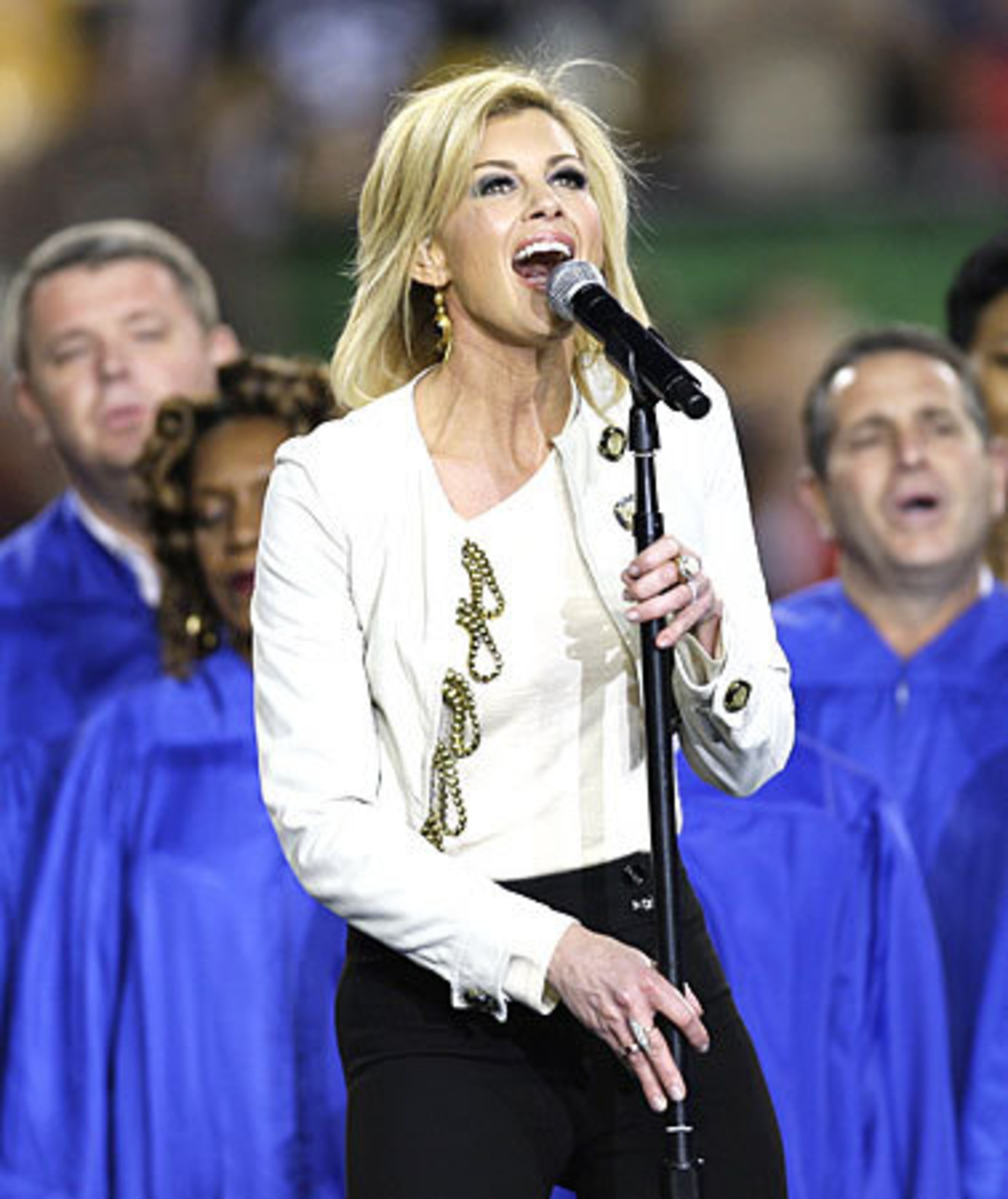 Faith Hill sings "America the Beautiful" before Super Bowl XLIII to begin the evening of music and, of course, football.