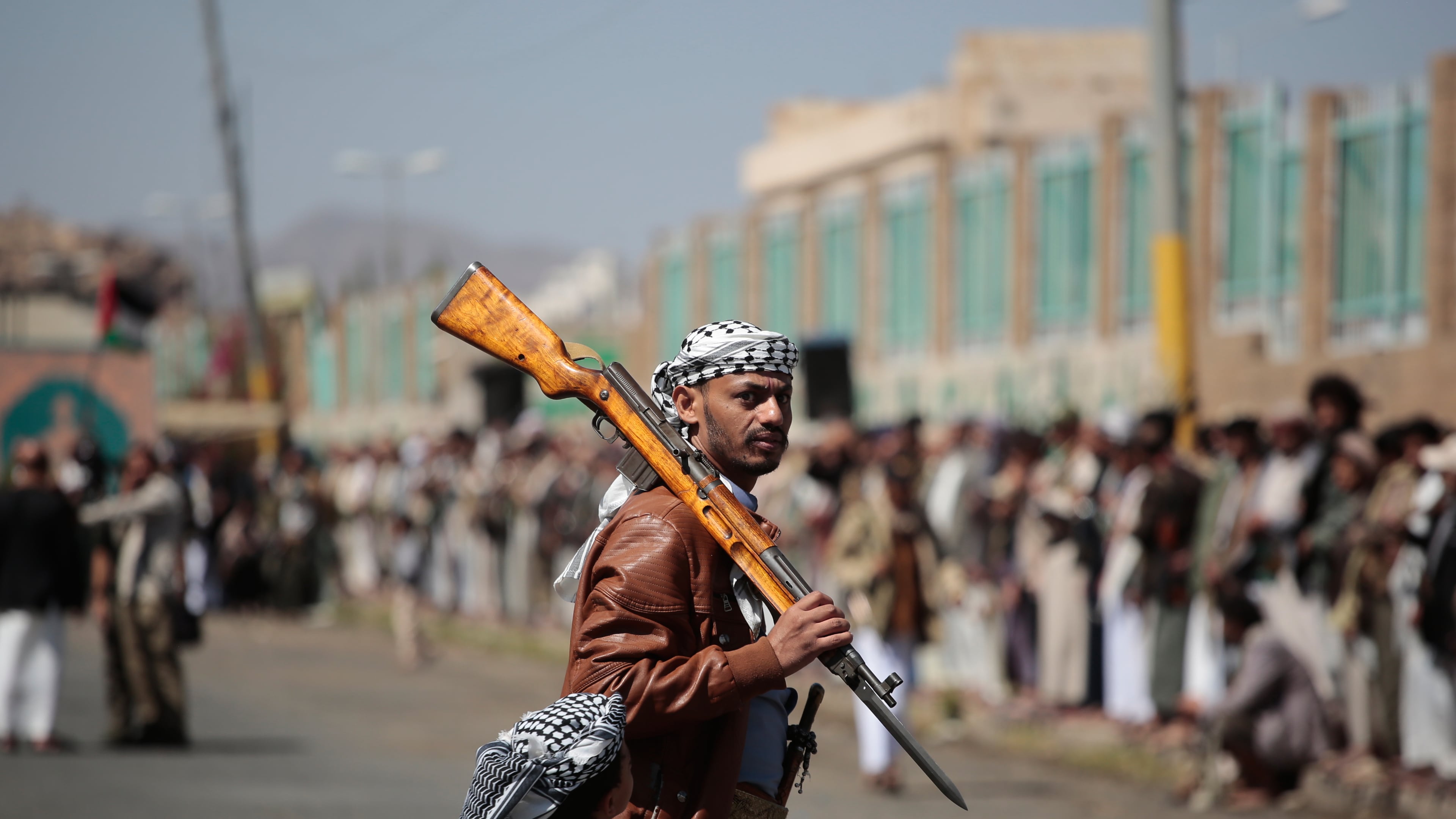 A Houthi supporter carries a rifle while attending an armed tribal rally in Sanaa, Yemen, Wednesday, Oct. 7, 2026. (AP Photo/Osamah Abdulrahman)