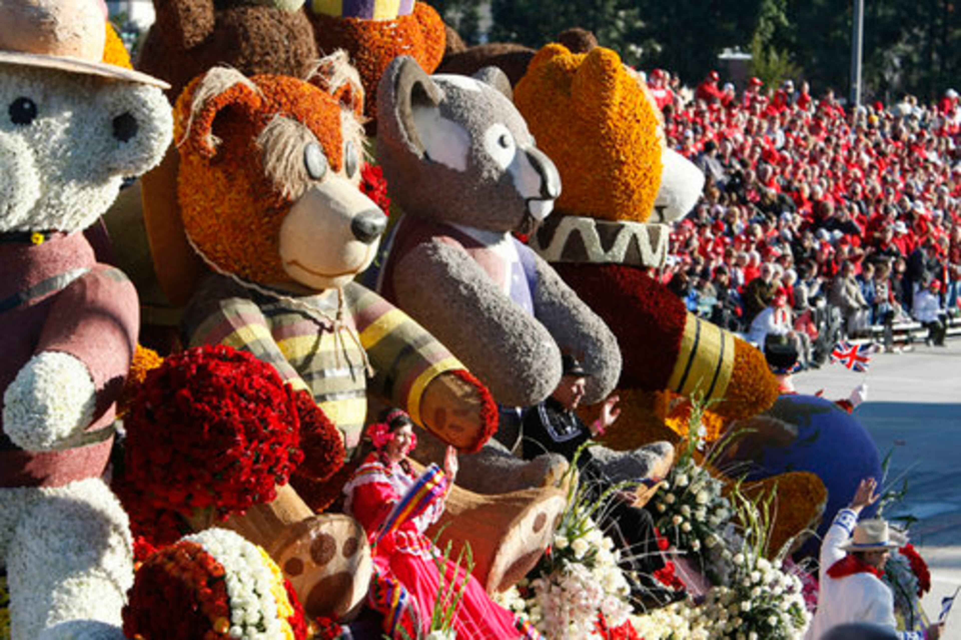 The Rotary International presented its bear-themed "Building Communities, Bridging Continents" float.