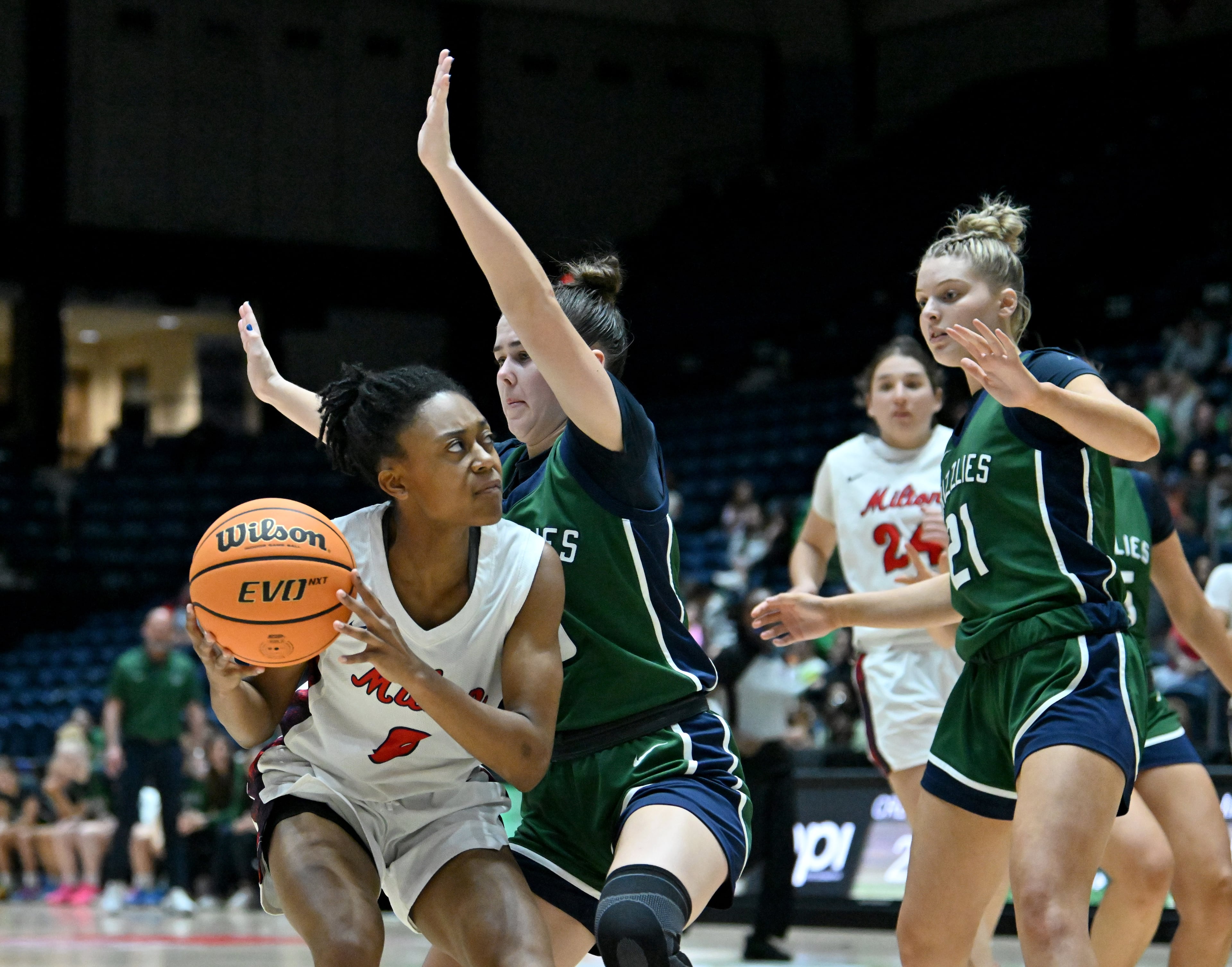 Milton’s Deyva Davis (0) prepares to shoot against Creekview’s Finley Howard (5) during the second half of the Class 5A Girls GHSA State Championship at the Macon Coliseum, Friday, March 13, 2026, in Macon. Creekview won 45-43 over Milton. (Hyosub Shin/AJC)