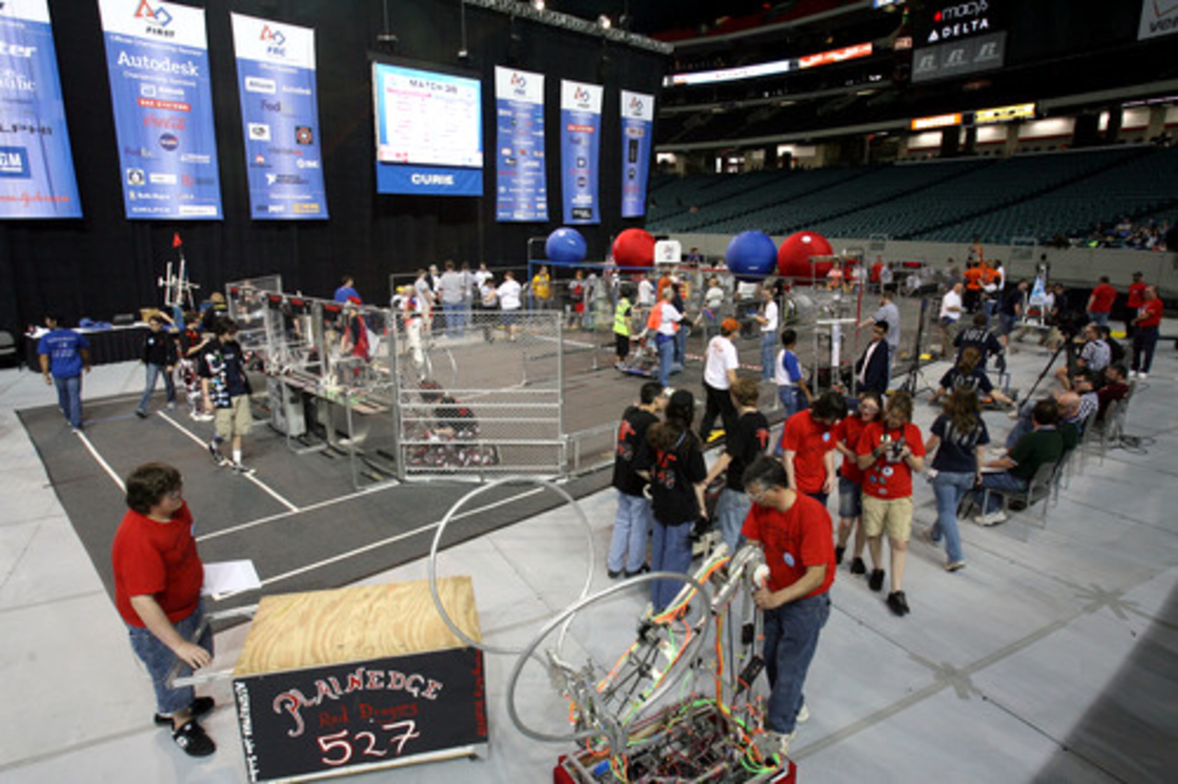 A robot from Plainedge High School in Massapequa, N.Y., gets rolled off the floor after a practice run. High-schoolers from across the United States, as well as Brazil, Canada, Israel and Mexico, attend the event.