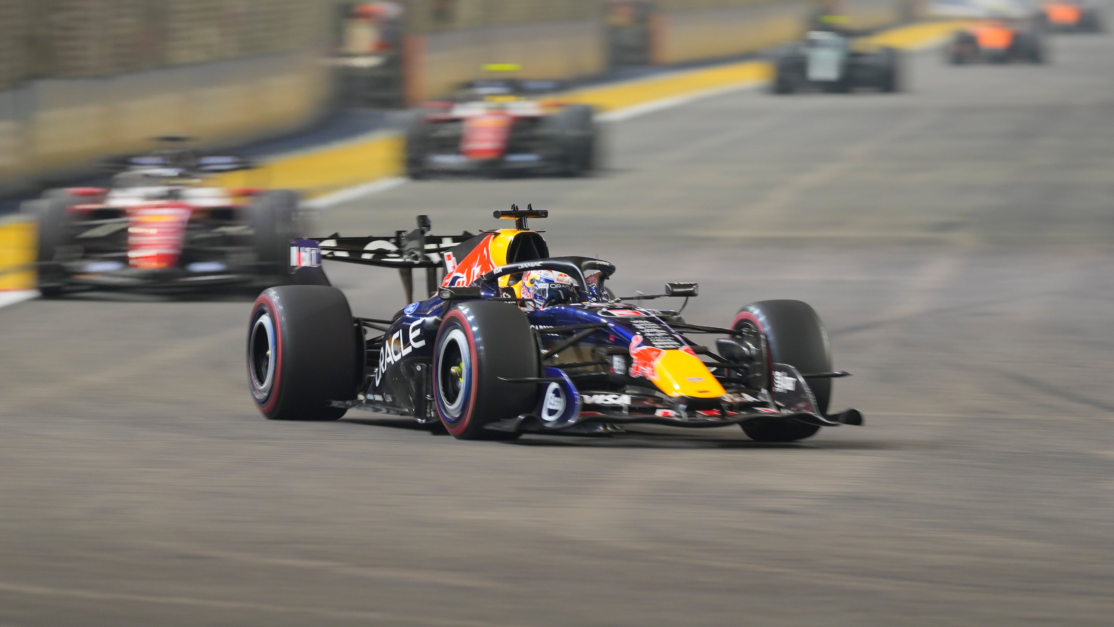 Red Bull driver Max Verstappen of the Netherlands steers his car during the Singapore Formula One Grand Prix race in Singapore, Sunday, Oct. 11, 2026. (AP Photo/Vincent Thian)