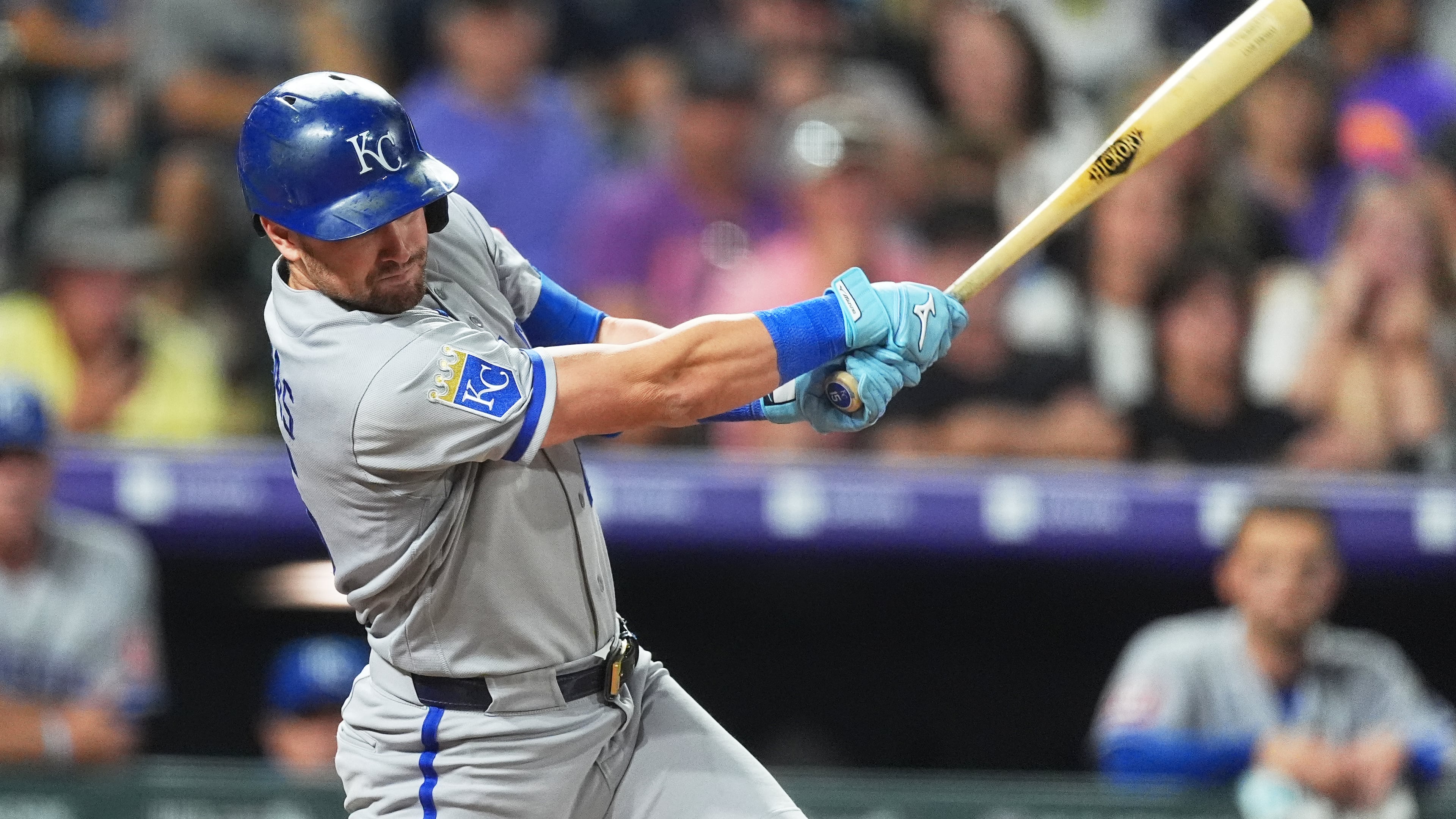 Kansas City Royals' Lane Thomas singles off Colorado Rockies starting pitcher Tomoyuki Sugano in the sixth inning of a baseball game Friday, July 31, 2026, in Denver. (AP Photo/David Zalubowski)
