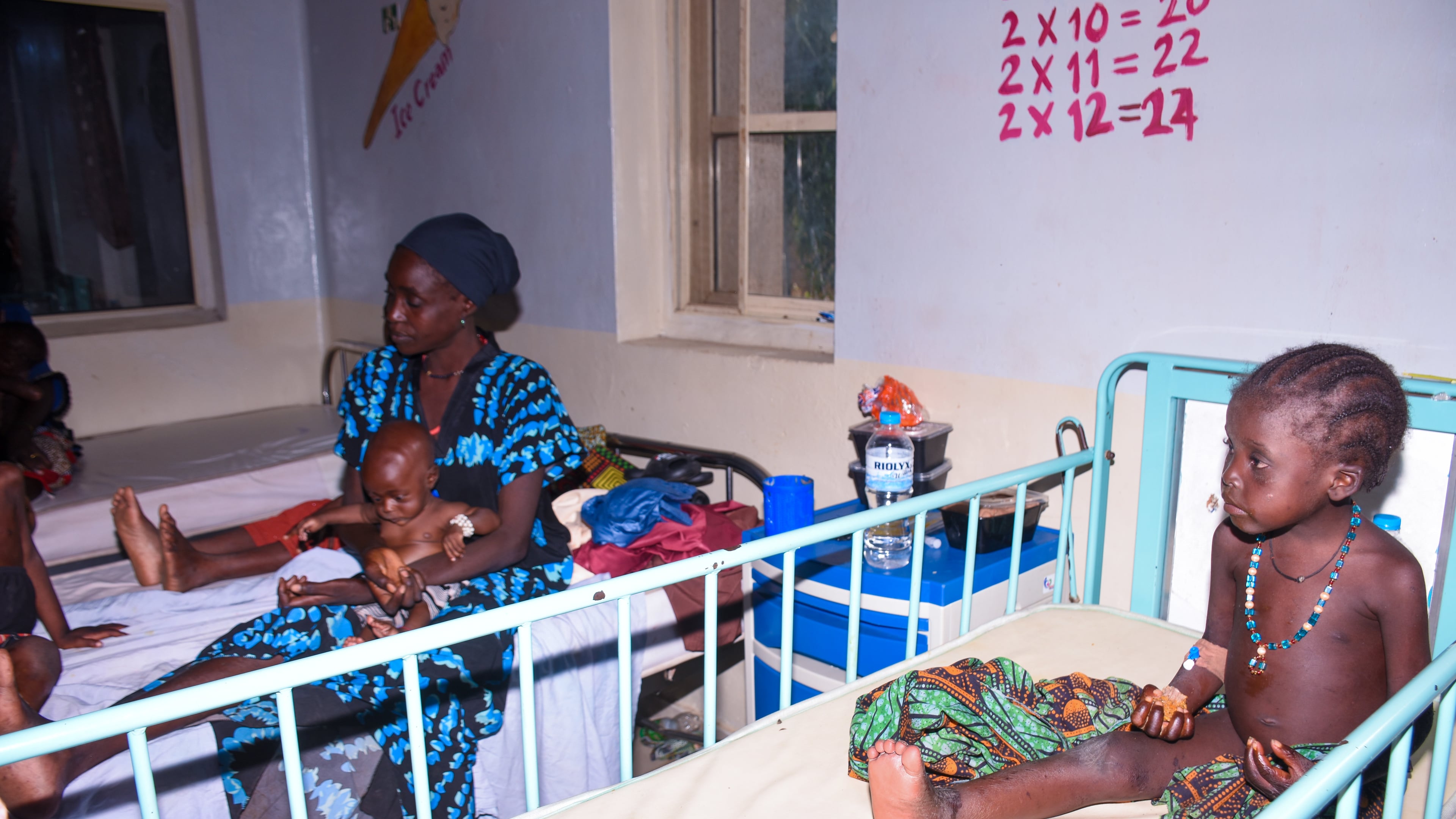Women and children who were rescued after being held in a forest after they were abducted from the Woro community by gunmen in February receive medical attention at a hospital in Ilorin, Nigeria, Friday, Aug. 7, 2026. (AP Photo/Abubakar Khadijat)