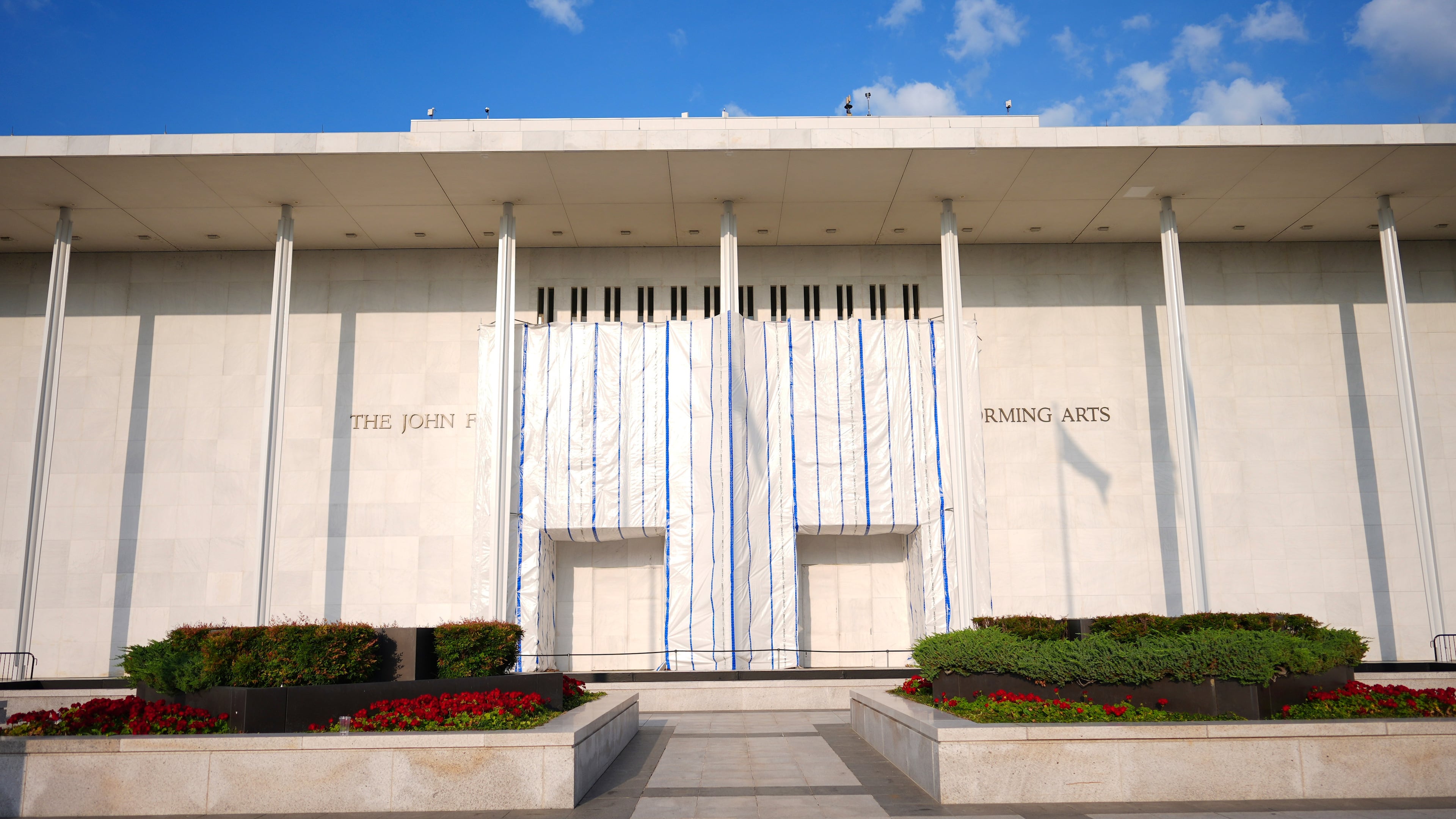 A tarp covers a portions of the signage at the John F. Kennedy Center for the Performing Arts, Thursday, Sept. 17, 2026 in Washington. (AP Photo/Pablo Martinez Monsivais)