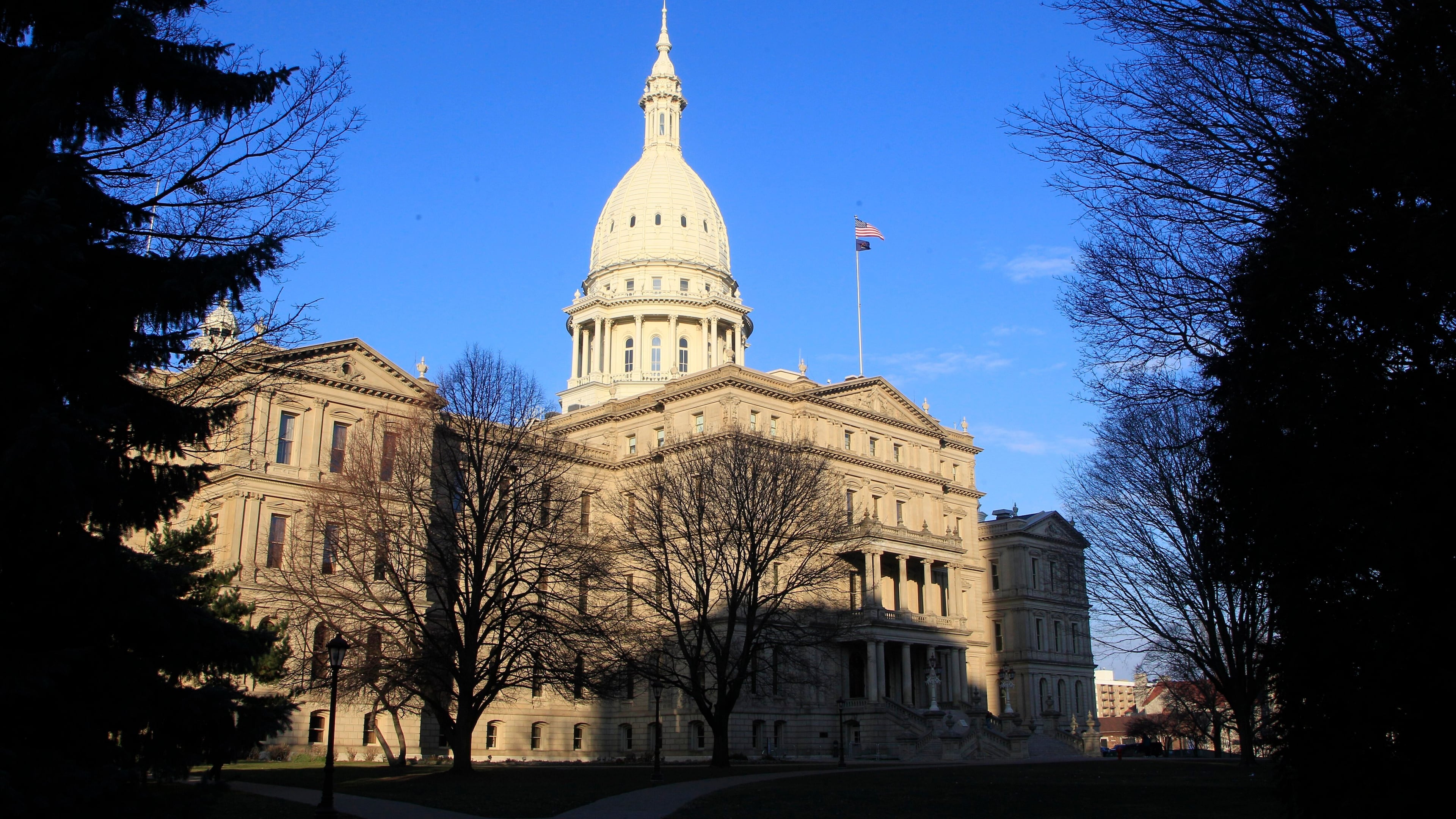 FILE - The state Capitol building is seen on Dec. 12, 2012, in Lansing, Mich. (AP Photo/Carlos Osorio, File)