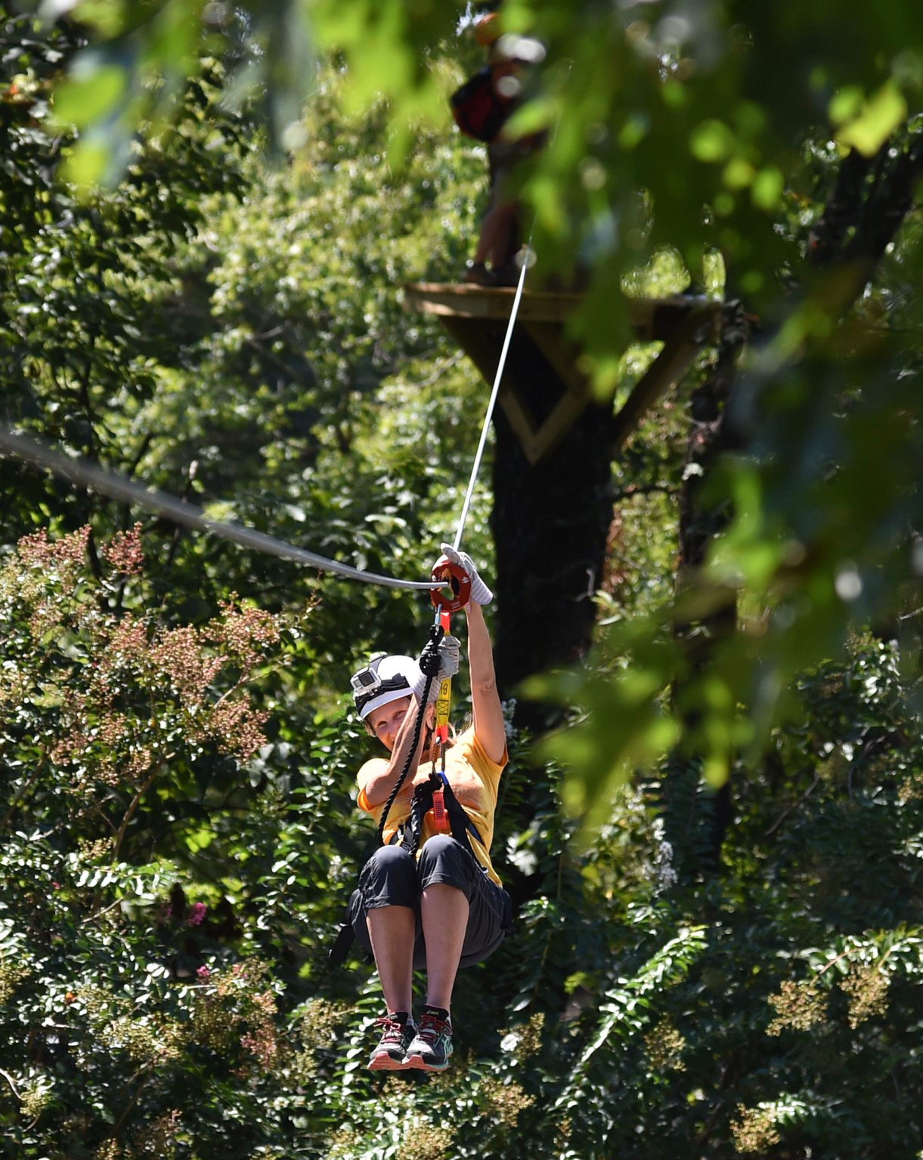 VIP guests were given a guided tour of the new zip line course at Amicalola Falls State Park in Dawsonville Thursday as part of the grand opening. The course is a canopy to canopy experience with 11 zip lines. BRANT SANDERLIN / BSANDERLIN@AJC.COM
