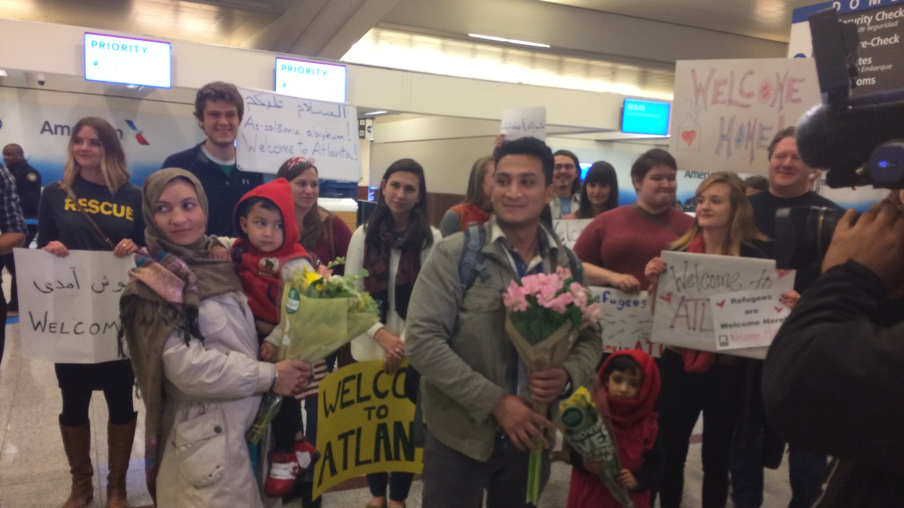 Wali Omari and his wife Parwana, along with their five-year-old daughter and three-year-old son landed at Hartsfield Jackson International-Airport just before midnight. Photo Ellen Eldridge