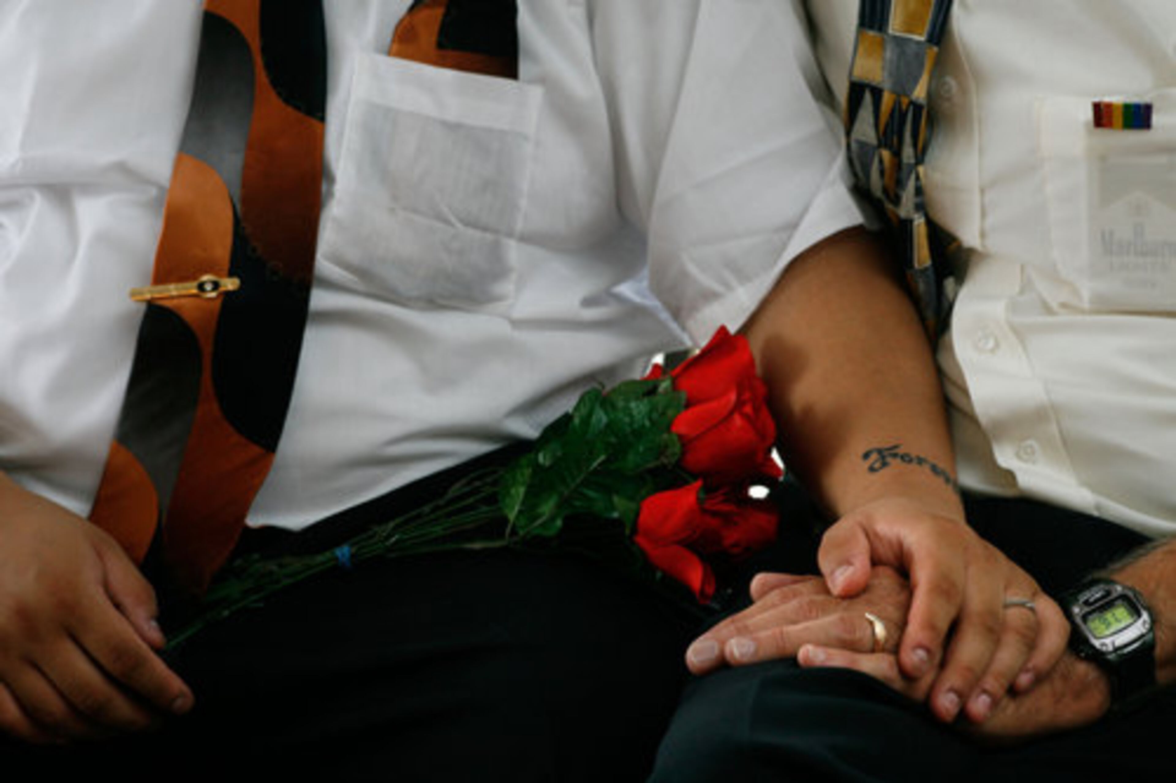 Andy Bo and Dennis Lee wait for event. "We can't get married legally, so we decided to do the ceremony," Lee said.