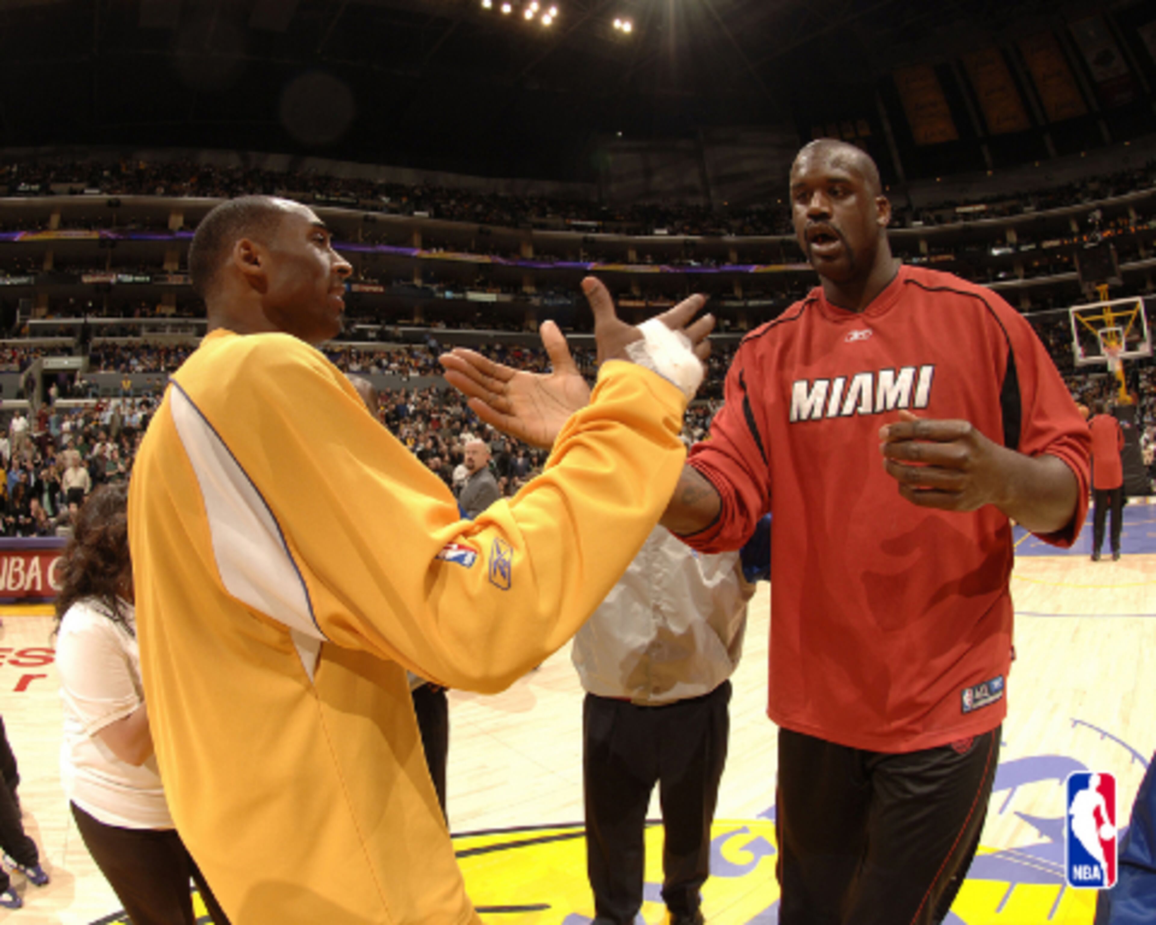 Moving forward handshake: Kobe Bryant and Shaquille O'Neal clashed in L.A. but parted ways and shook hands later.