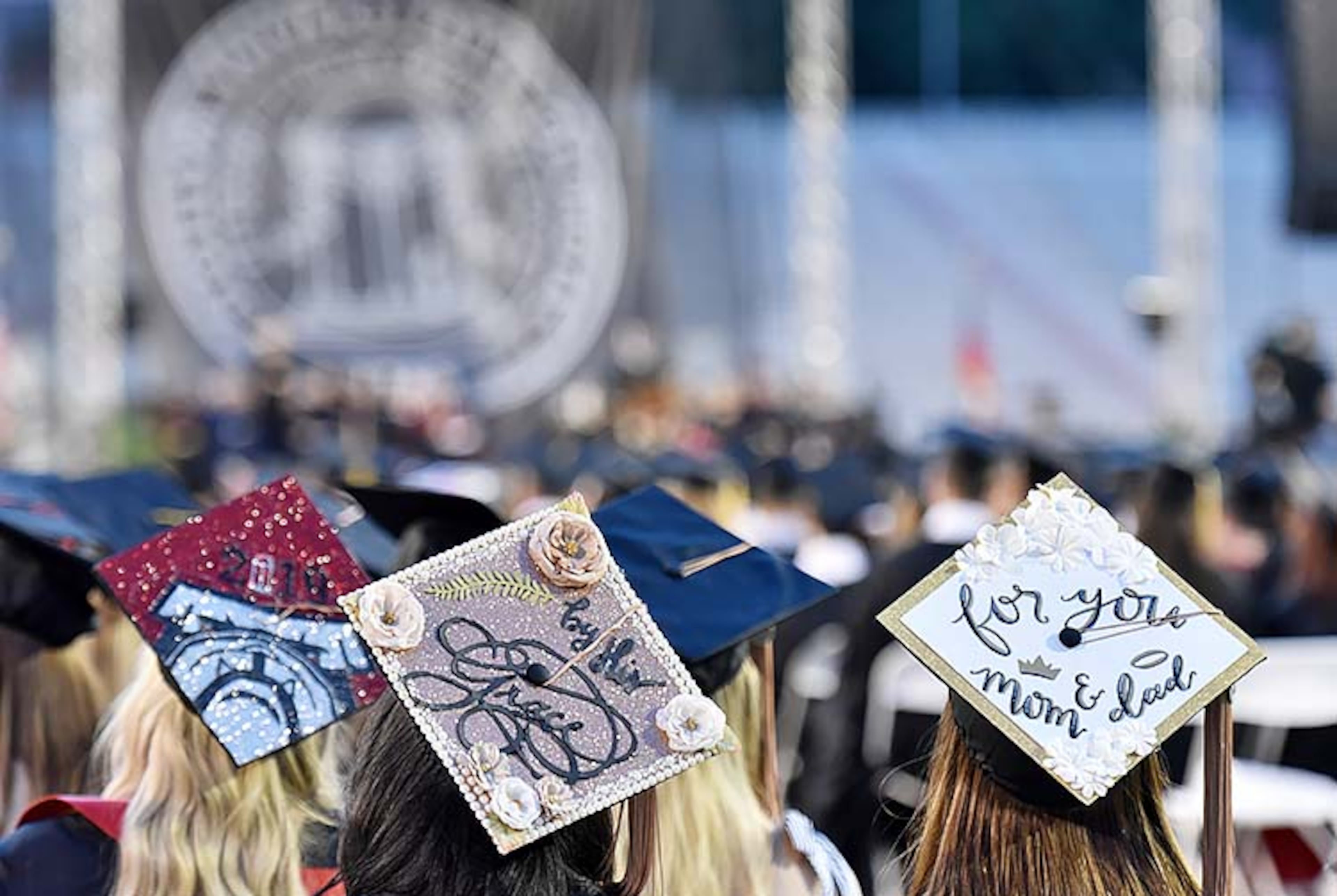 May 10, 2019 Athens - University of Georgia students personalized their mortar boards during 2019 spring undergraduate commencement ceremony at Sanford Stadium in Athens on Friday, May 10, 2019. HYOSUB SHIN / HSHIN@AJC.COM