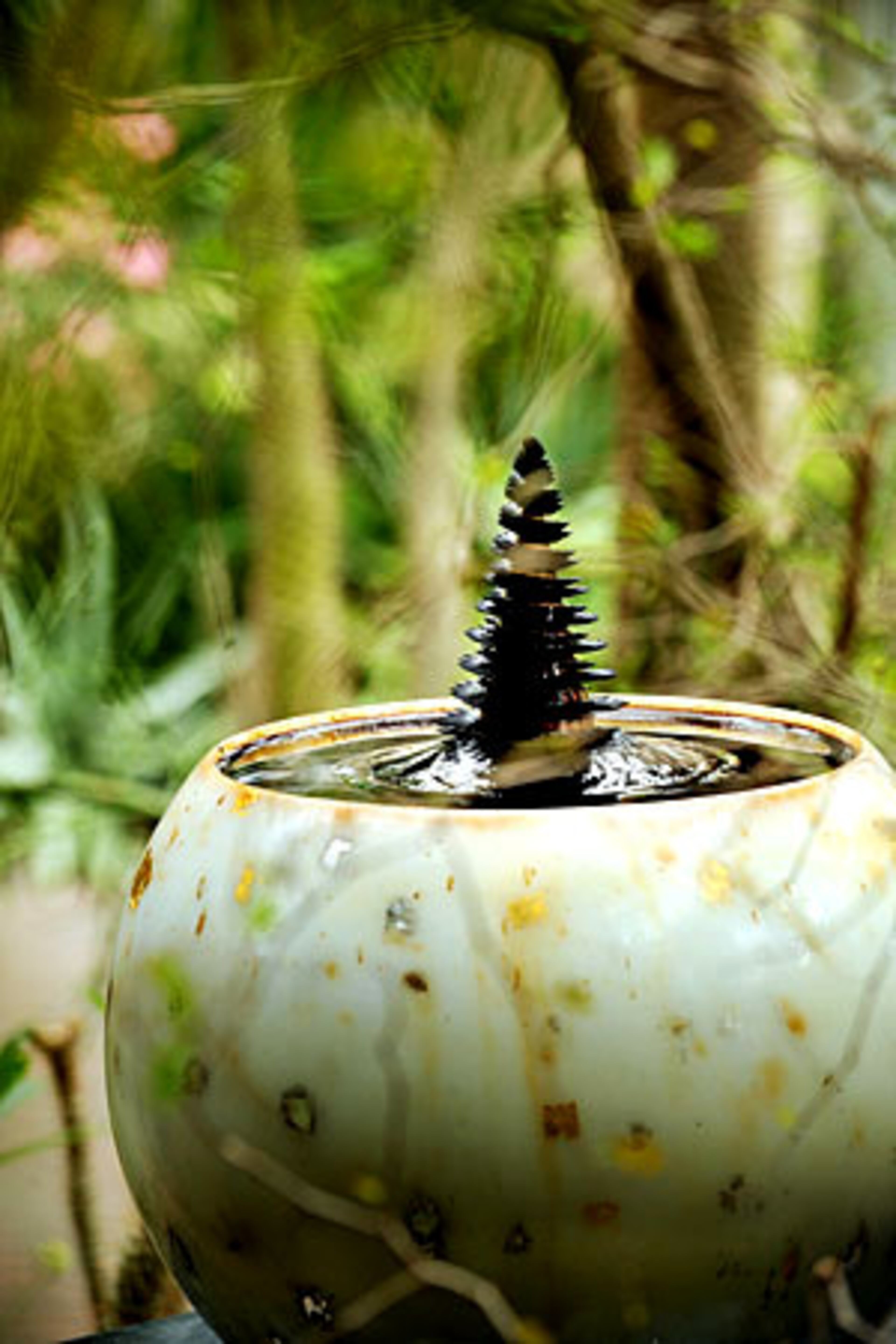 'Morpho Tower' by Sachiko Kodama employs electro-magnets and magnetically-charged microfine particles suspended in water or oil to create moving sculptural art forms.