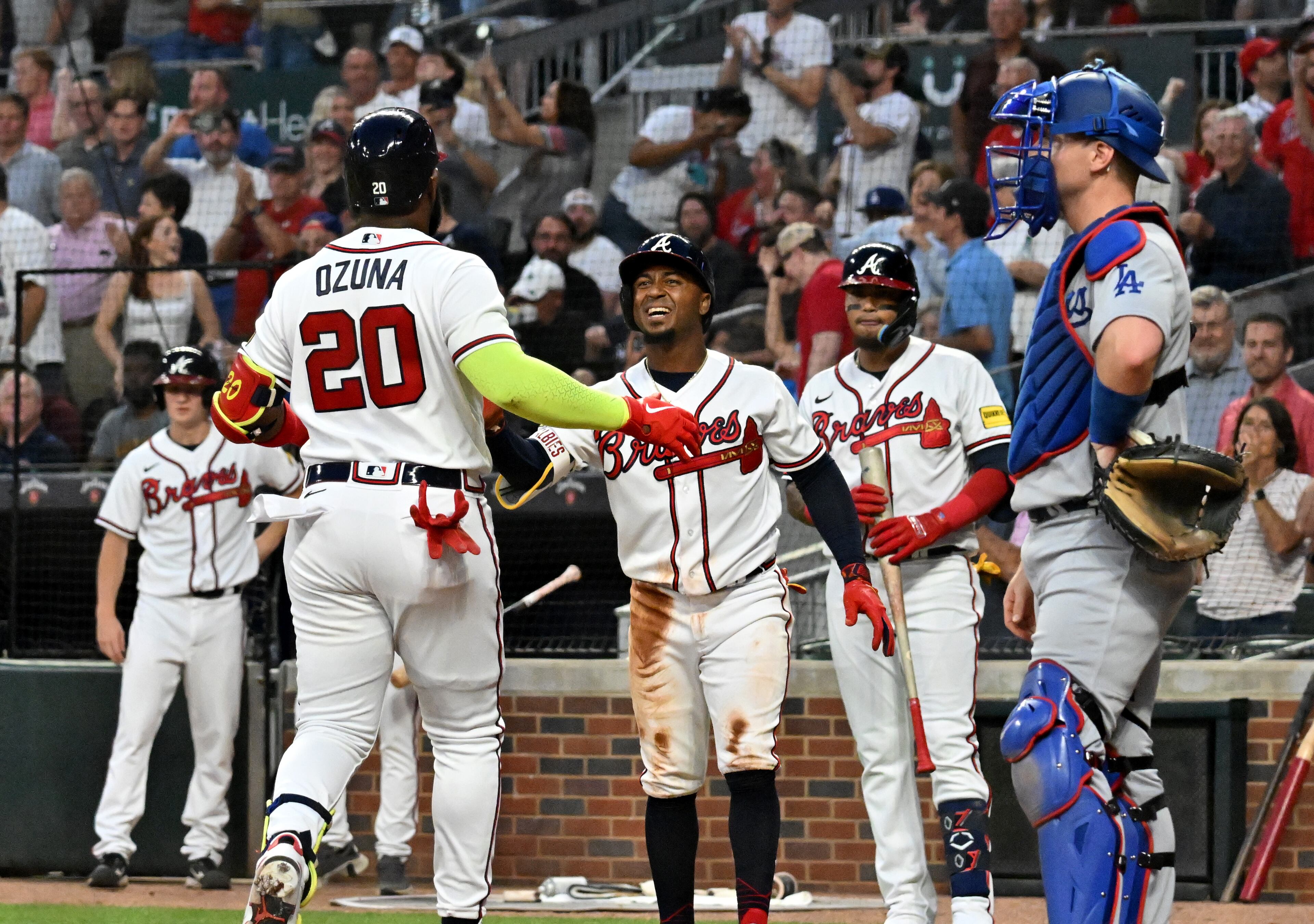 Atlanta Braves' designated hitter Marcell Ozuna (20) celebrates after hitting a 2-run home run to score Atlanta Braves' second baseman Ozzie Albies during the fifth inning at Truist Park, Wednesday, May 24, 2023, in Atlanta. (Hyosub Shin / Hyosub.Shin@ajc.com)