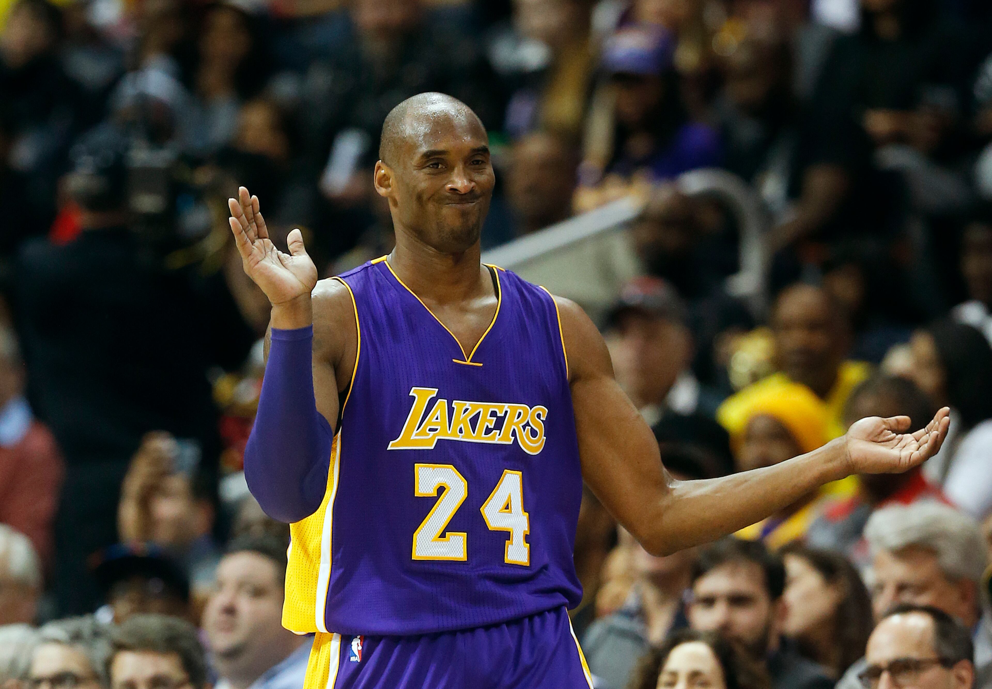 Los Angeles Lakers forward Kobe Bryant (24) reacts after missing a basket in the first half of an NBA basketball game against the Atlanta Hawks, Friday, Dec. 4, 2015, in Atlanta. Bryant has announced that he plans to retire at the end of the season. (AP Photo/John Bazemore)