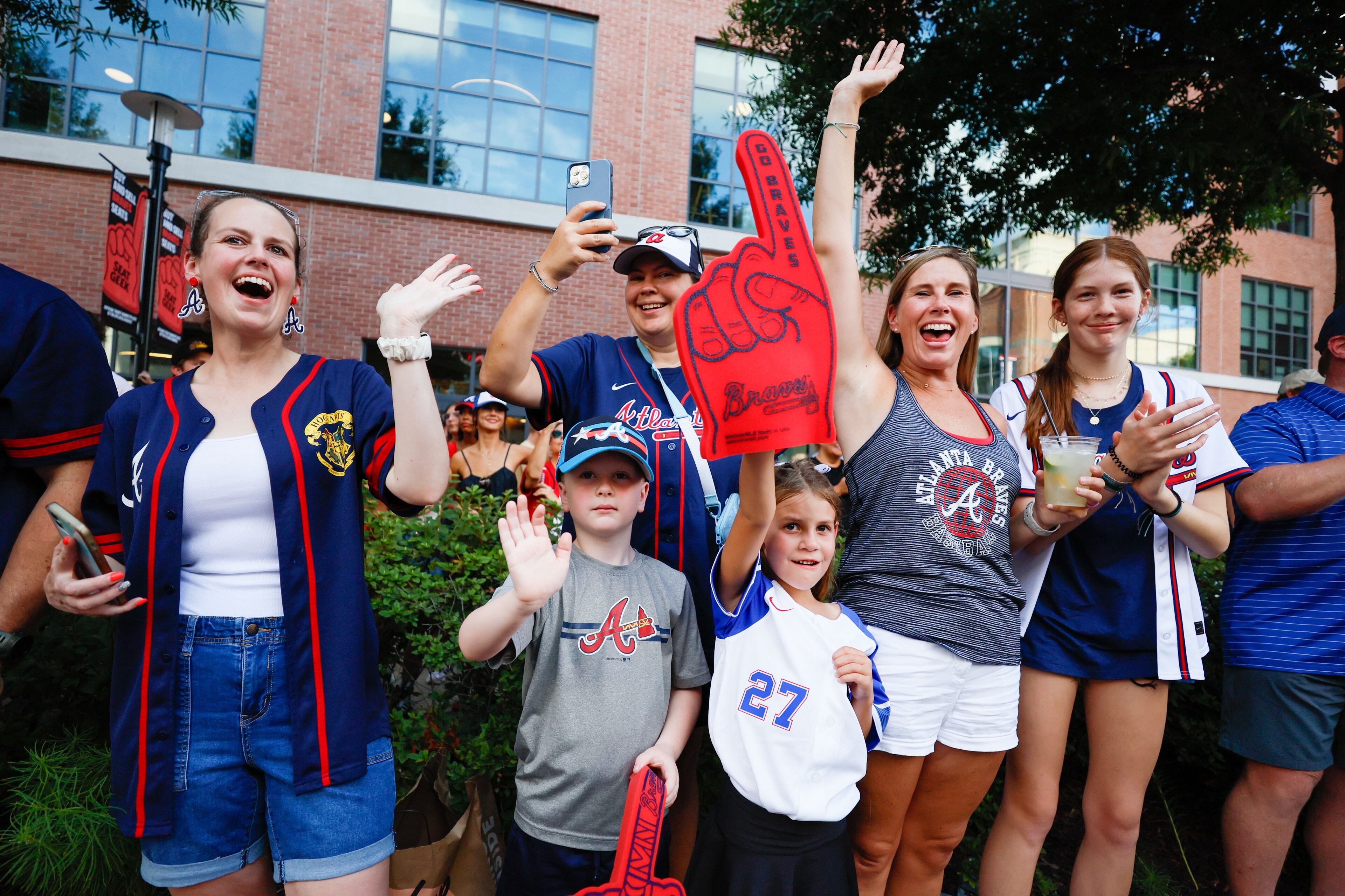 Fans cheer former Braves players who participated in the parade through The Battery Atlanta during the unveiling celebrations for the All-Star game. They will serve as All-Star ambassadors for next year’s tournament on Monday, July 22, 2024.
(Miguel Martinez/ AJC)