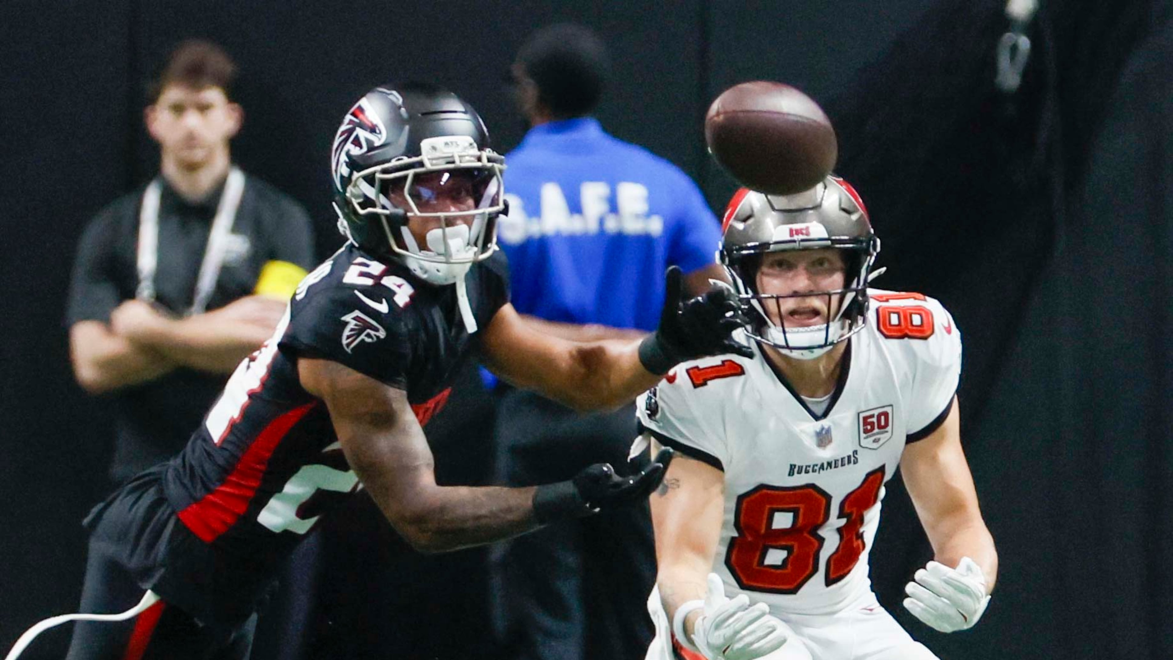 Atlanta Falcons cornerback A.J. Terrell Jr. (left) fights for the ball as Tampa Bay Buccaneers wide receiver Ryan Miller watches during the second half of an NFL game at Mercedes-Benz Stadium on Sunday, Sept. 7, 2025, in Atlanta. (Miguel Martinez/AJC)