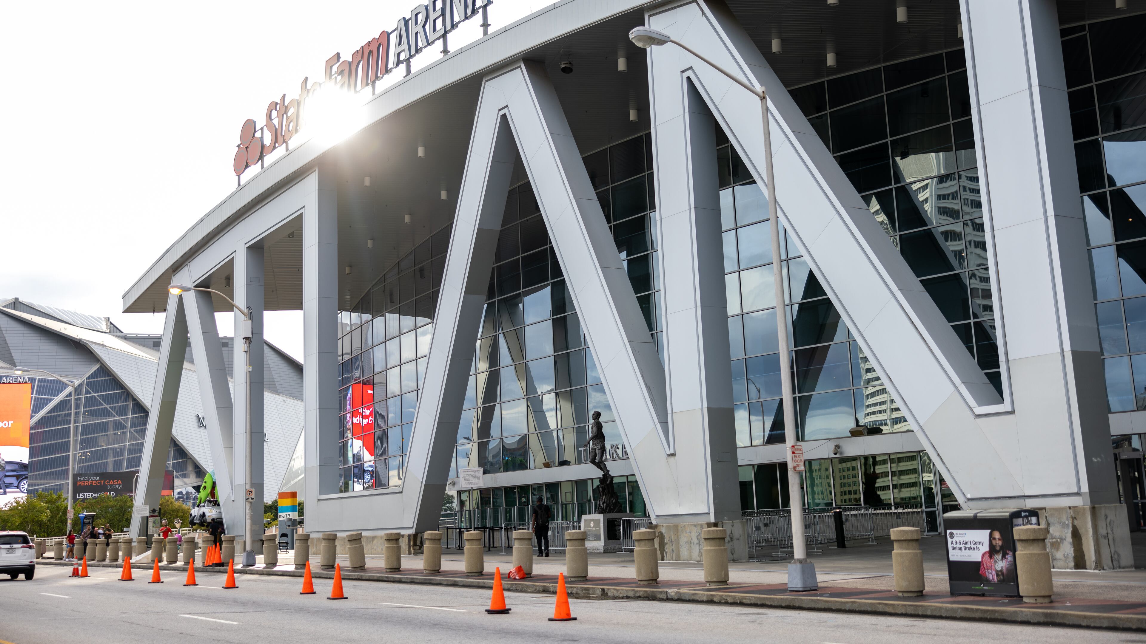 State Farm Arena sign with sun glaring through sign on August 25, 2022