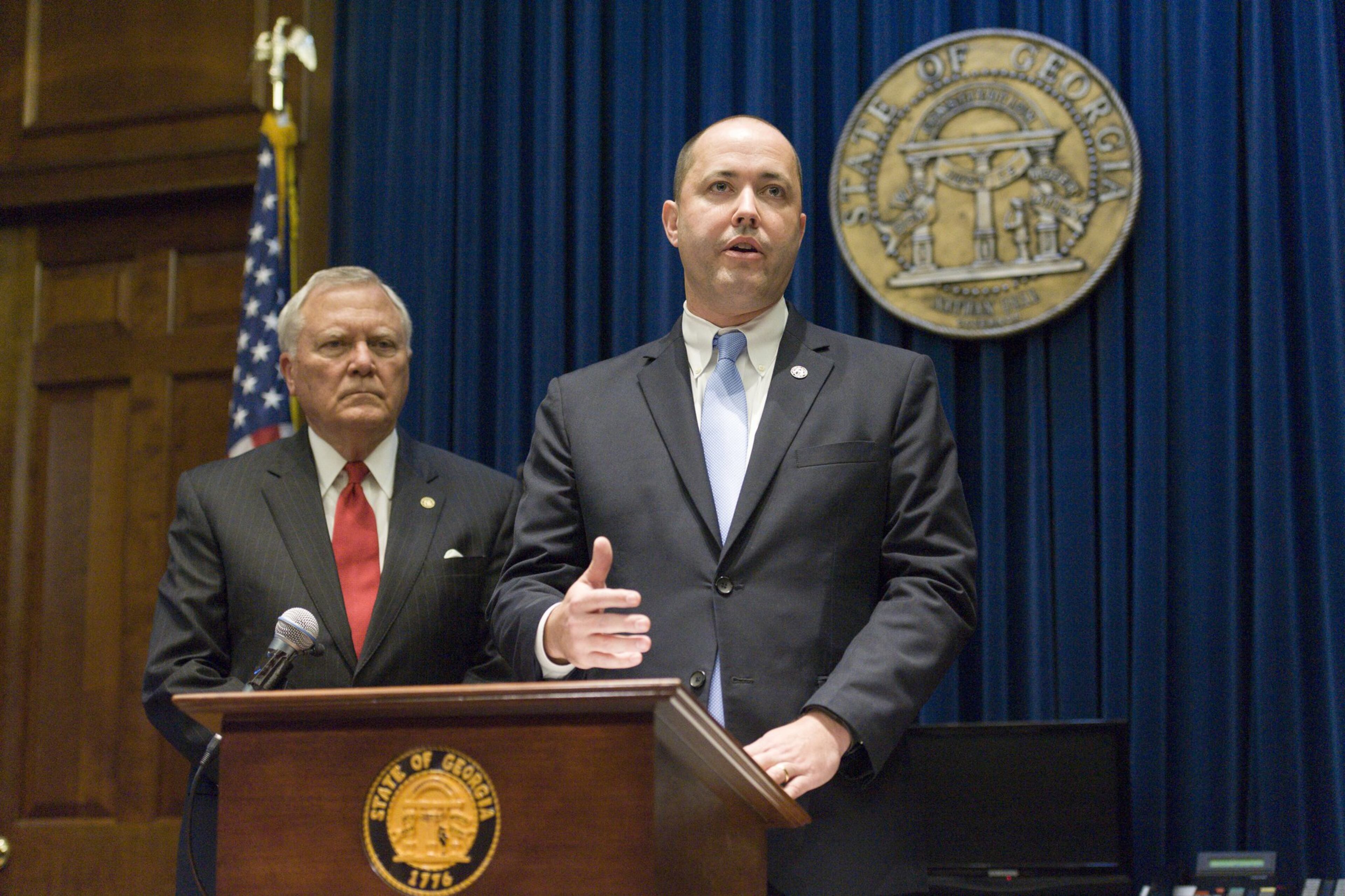 Chris Carr (right) answers questions as Gov. Nathan Deal listens during a press conference in October 2016 in Atlanta regarding Carr’s appointment as Georgia’s next attorney general.