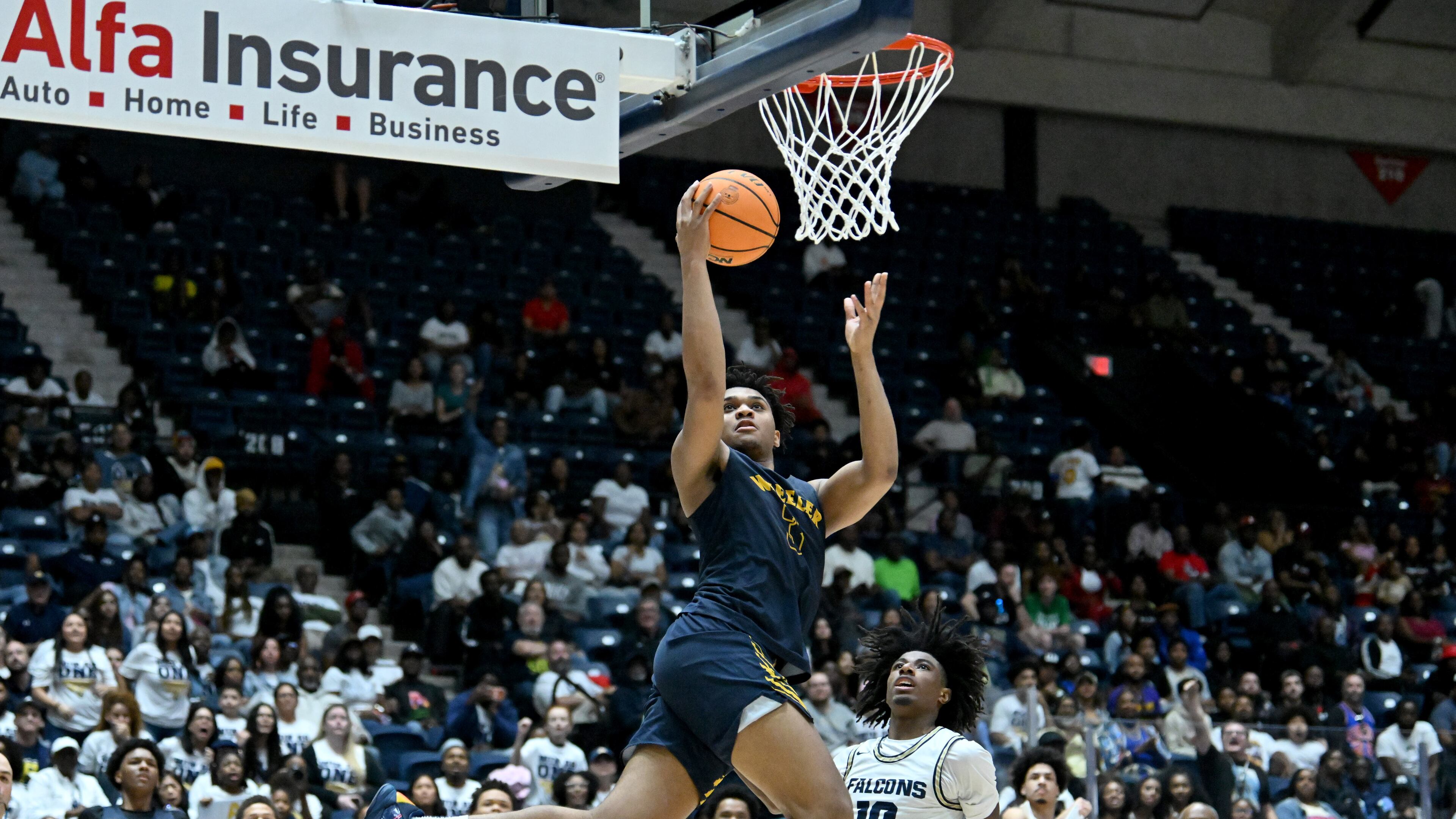Wheeler's Colben Landrew — pictured going for a layup in the Class 6A state championship game against Pebblebrook on Saturday, March 14, 2026 — had one of the top performances in this year's title games, with 29 points and 12 rebounds. (Hyosub Shin/AJC)