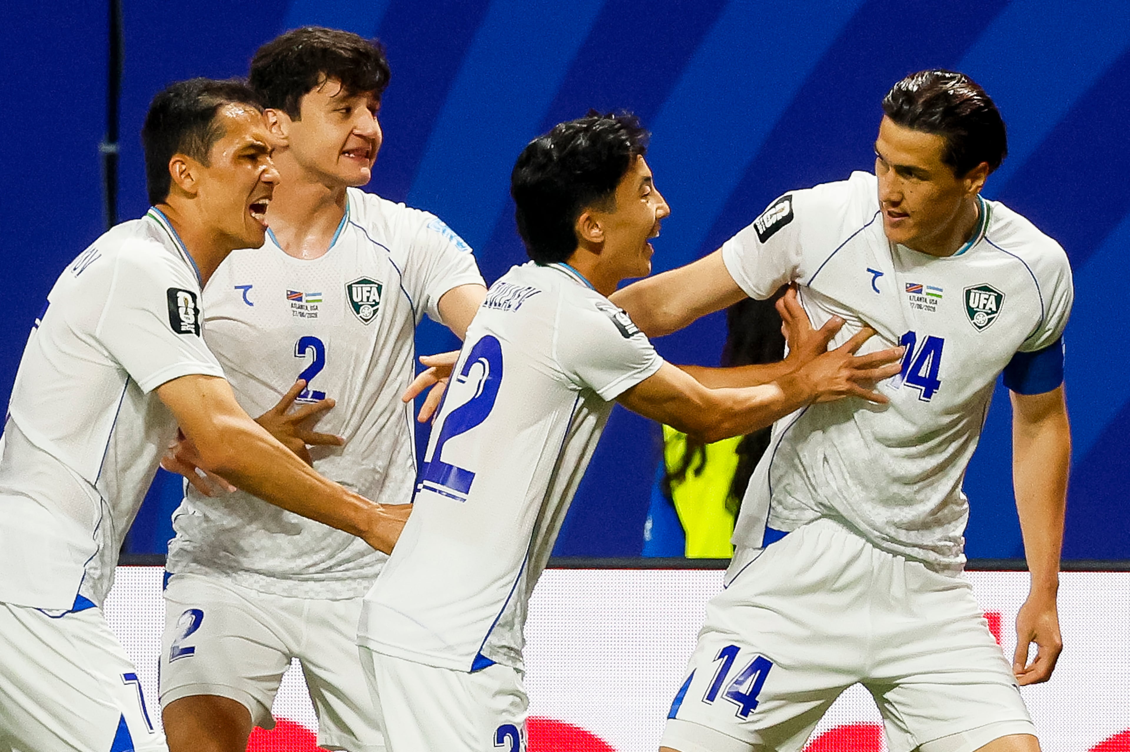 Uzbekistan forward Eldor Shomurodov (right) celebrates with teammates after scoring a goal over Congo during the first half of a FIFA World Cup match at Atlanta Stadium (Mercedes-Benz Stadium) on Saturday, June 27, 2026, in Atlanta. (Miguel Martinez/AJC)