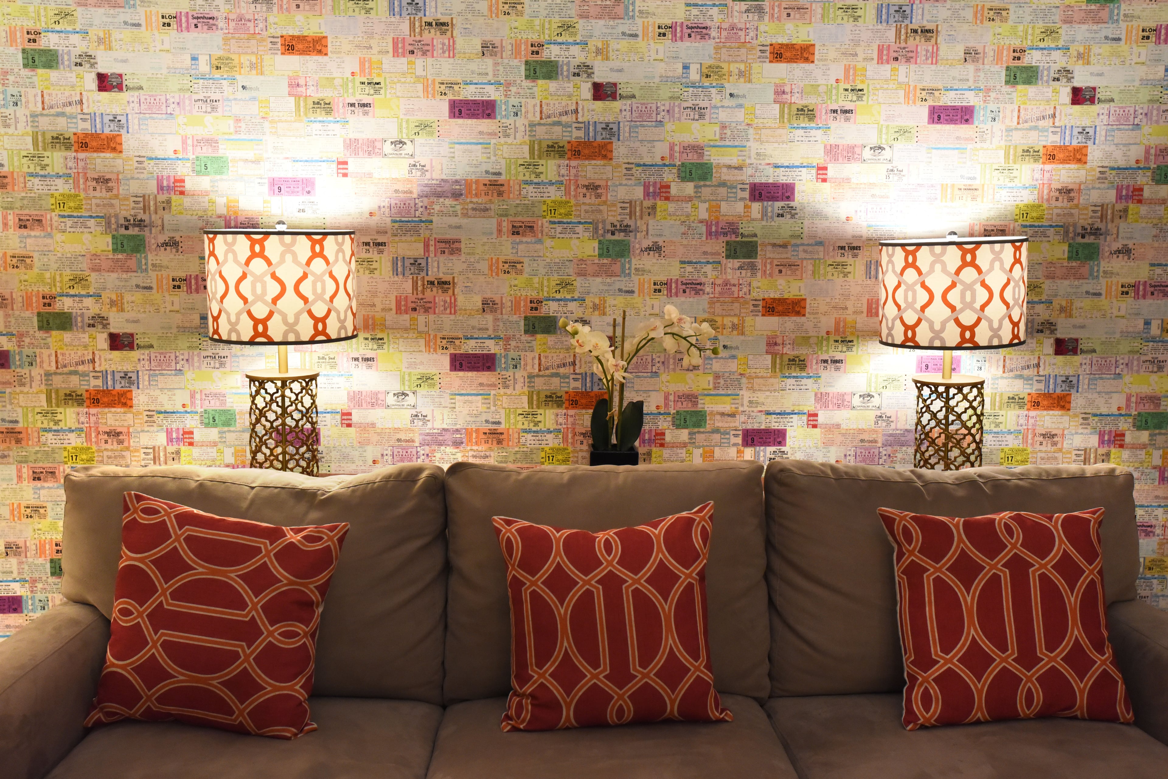 Ticket stubs from more than 40 years of shows at the Fox Theatre in Atlanta adorn a wall of a dressing room in the theater. HYOSUB SHIN / HSHIN@AJC.COM