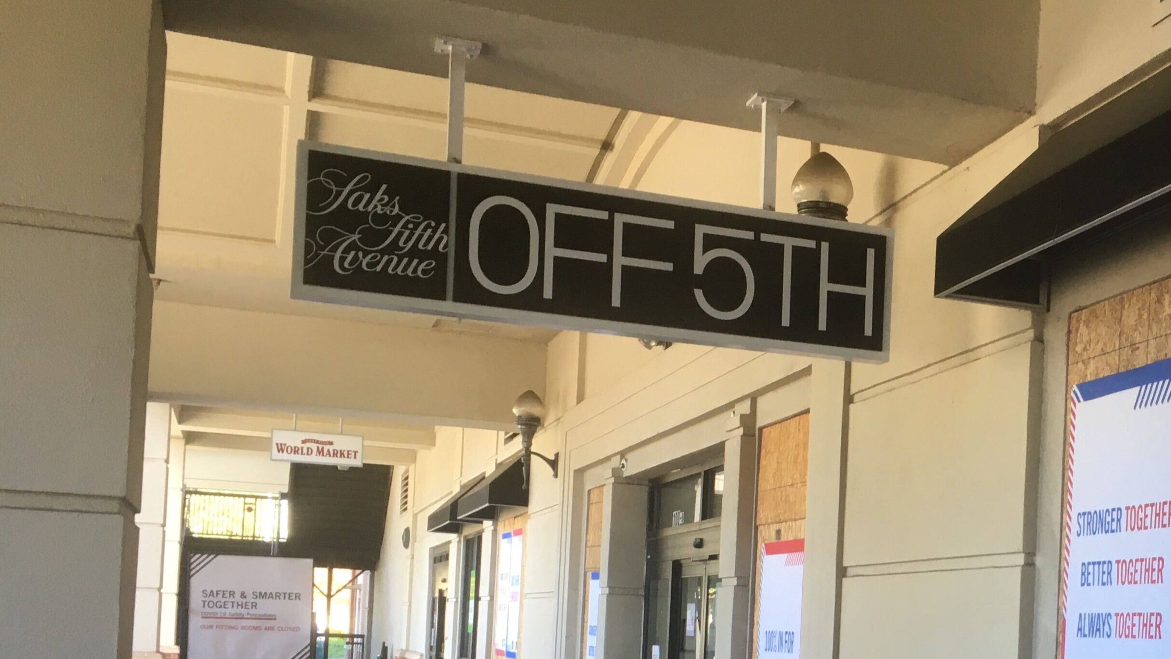 The Saks Off 5th in Buckhead will remain open after the company announced dozens of closures across the United States. (AJC file)