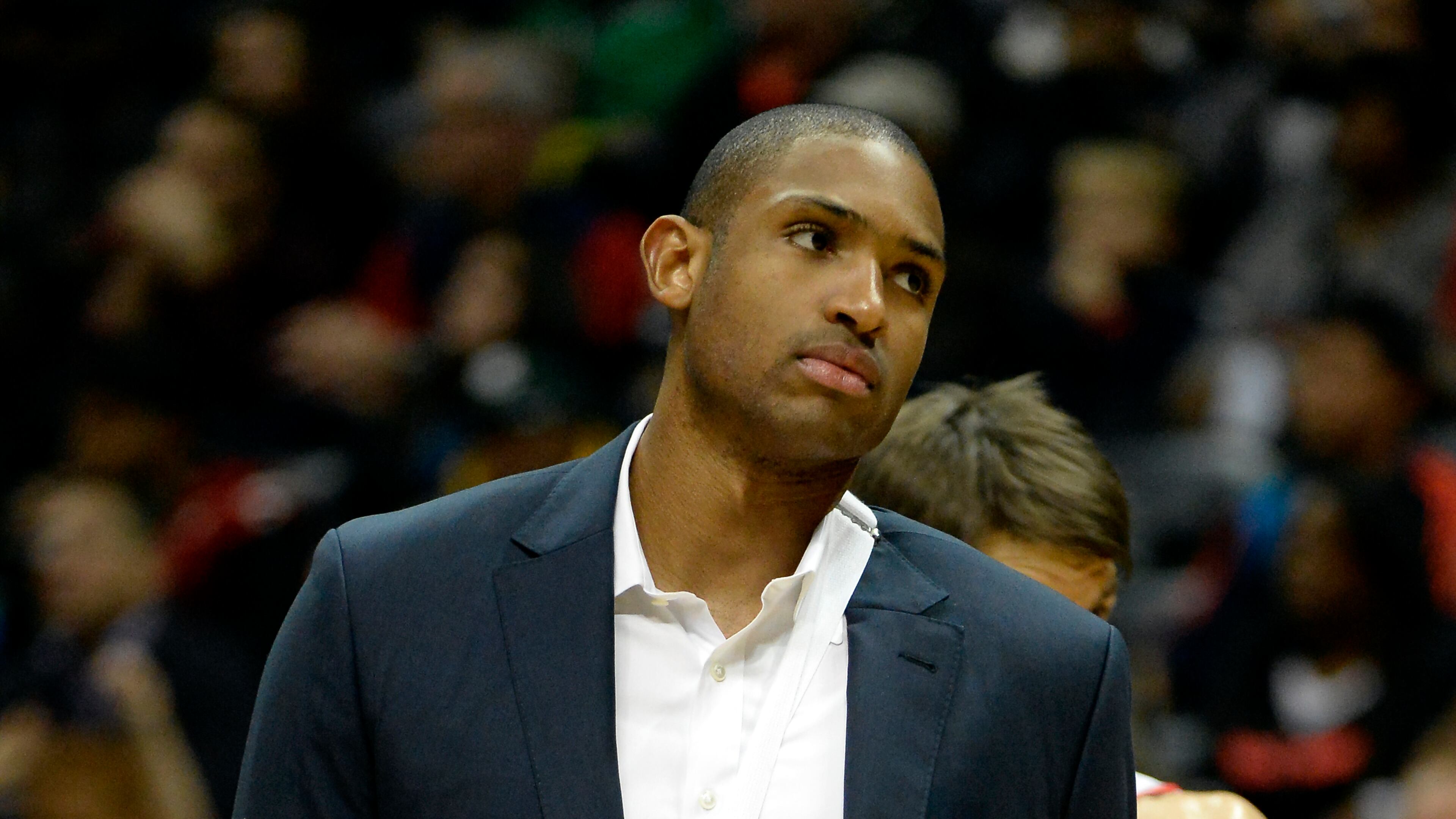 Atlanta Hawks center Al Horford joins the team for a timeout in the overtime period of their NBA basketball game against the Charlotte Bobcats on Saturday, Dec. 28, 2013, in Atlanta. Horford tore his right pectoral muscle earlier this week against the Cleveland Cavaliers and is out indefinitely, according to the team. (AP Photo/David Tulis) The Hawks have faded lately without injured center Al Horford. (David Tullis/Associated Press)