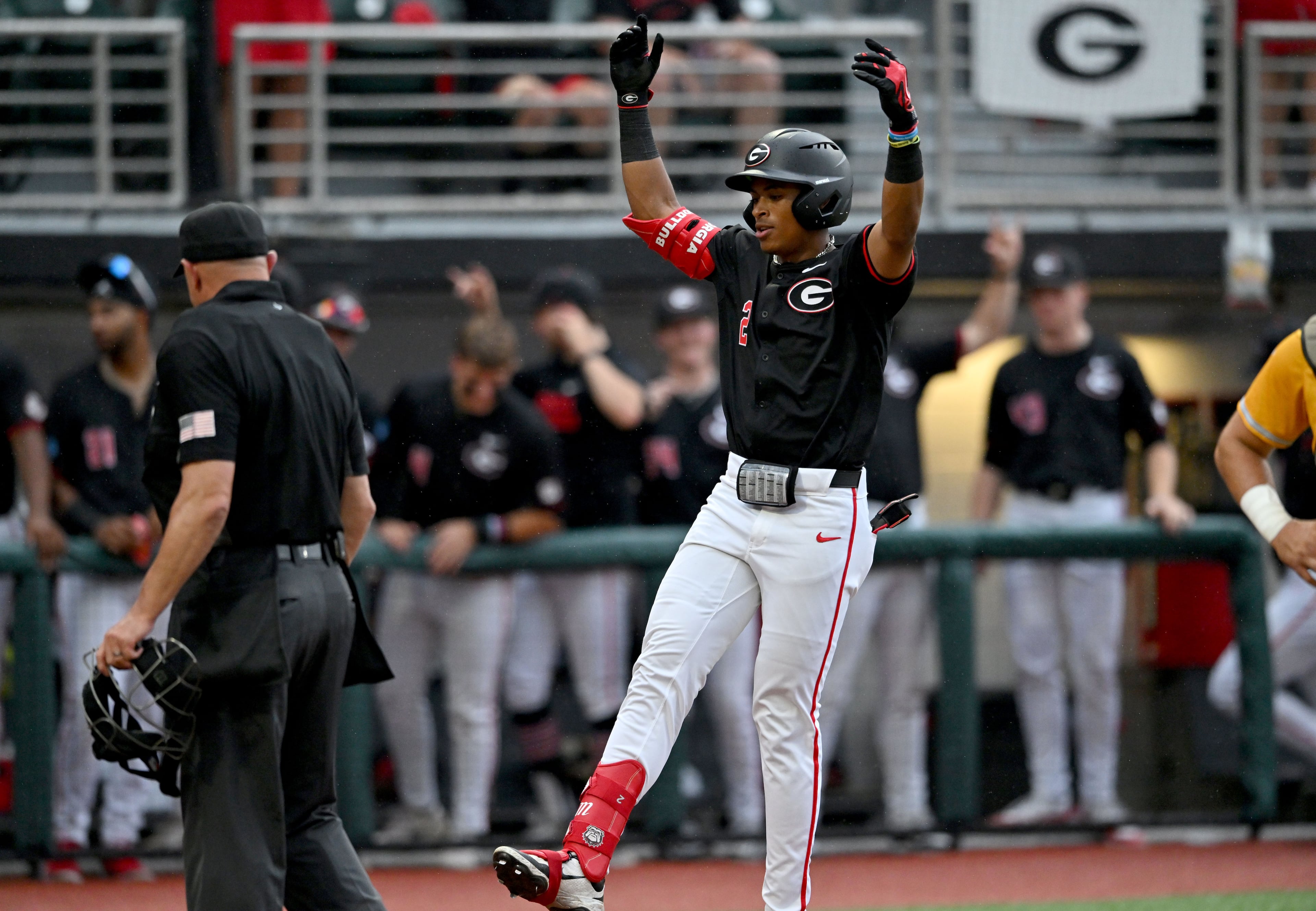 Georgia infielder Ryan Black (2) celebrates as he circles the bases on a solo home run during the fifth inning of their NCAA Regional game at Foley Field, Friday, May 29, 2026, in Athens. (Hyosub Shin/AJC)