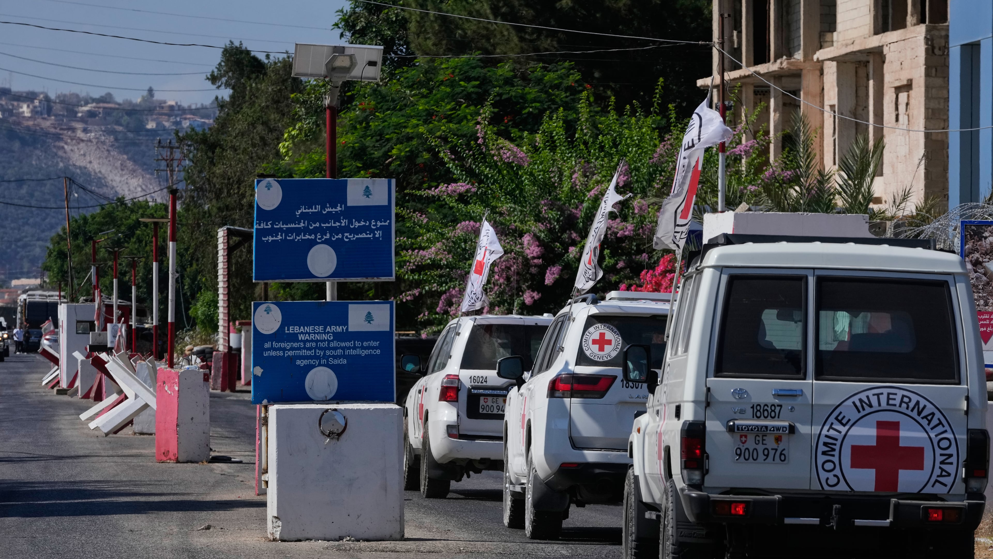A Red Cross convoy passes a Lebanese checkpoint near the border with Israel in the southern village of Mansouri, Lebanon, Friday, Sept. 4, 2026. (AP Photo/Mohammed Zaatari) CORRECTION: A Red Cross convoy, instead of U.N. peacekeeper convoy