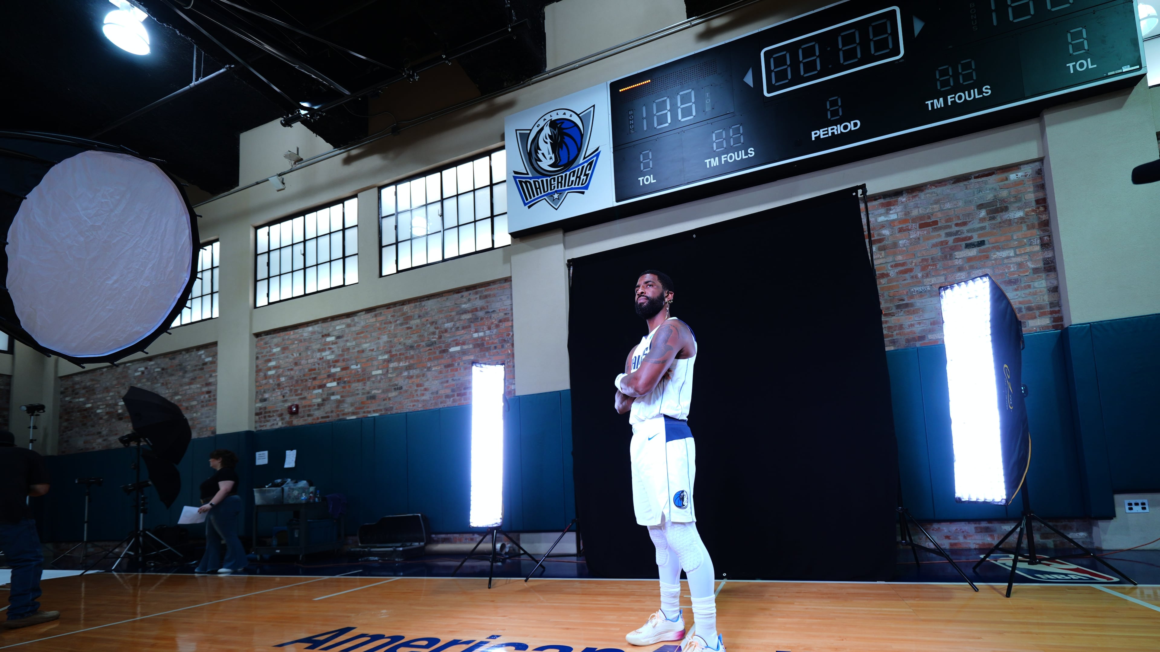 Dallas Mavericks' Kyrie Irving poses for photographs during his team's NBA basketball media day Friday, Sept. 25, 2026, in Dallas. (AP Photo/Julio Cortez)