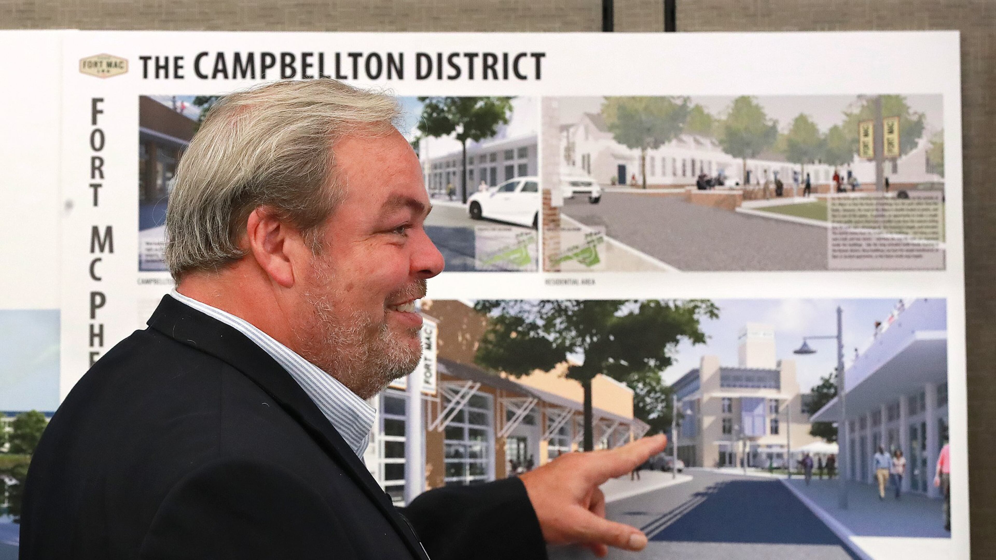 Developer Stephen Macauley describes the proposed Campbellton district to some audience members during the McPherson Implementing Local Redevelopment Authority Board Meeting at Fort Mac LRA in July in Atlanta. Macauley and the LRA have since parted ways. CURTIS COMPTON / CCOMPTON@AJC.COM