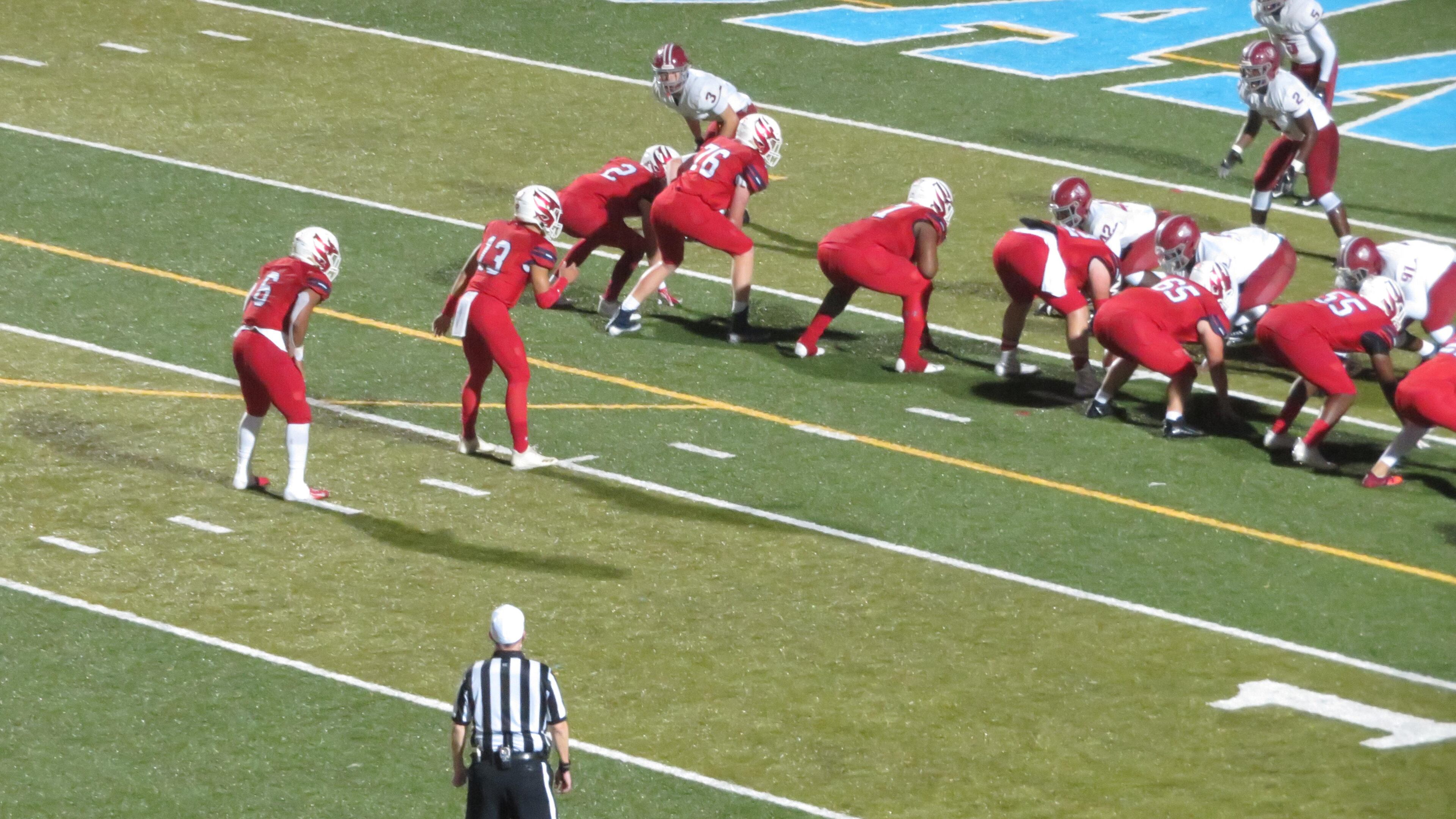 Milton Eagles quarterback Jordan Yates waits for the ball to be snapped in a Class AAAAAAA semifinal game against the Lowndes Vikings at Denmark High Stadium on Friday, Nov. 30, 2018. (Adam Krohn/special)