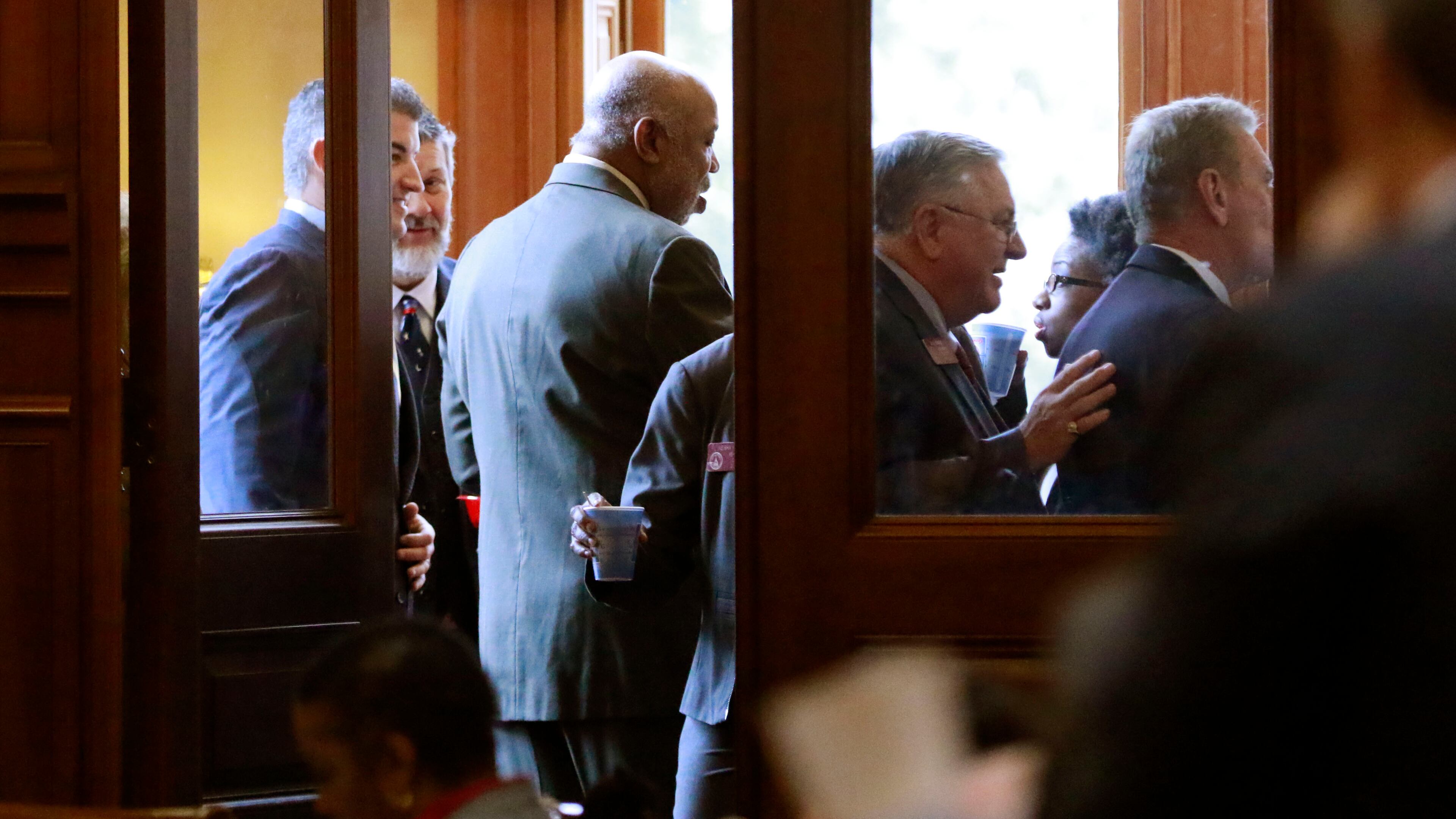 Lawmakers gather in the House anteroom. Bob Andres, bandres@ajc.com