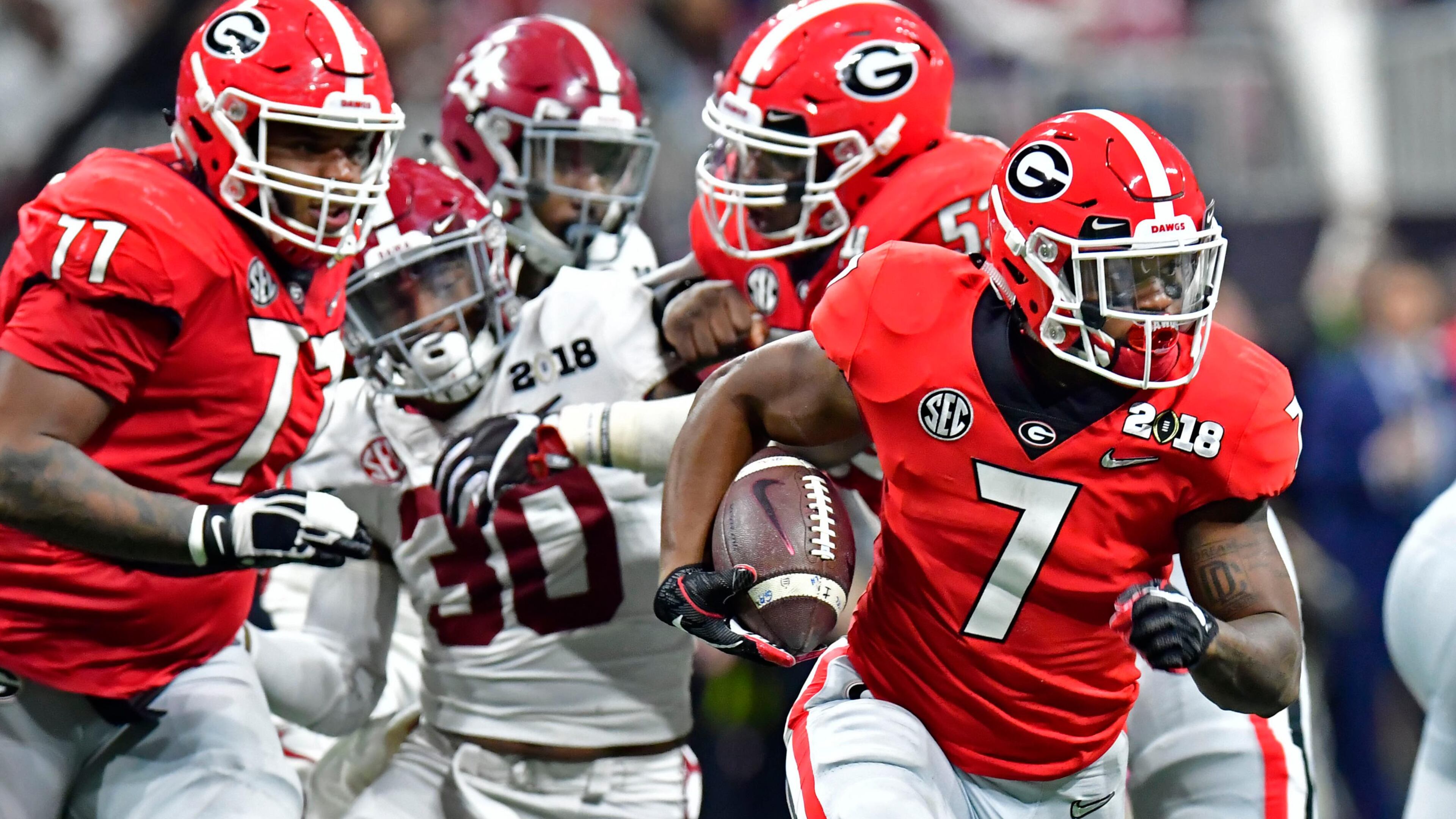 Georgia’s D'Andre Swift runs with ball in the second half against Alabama.