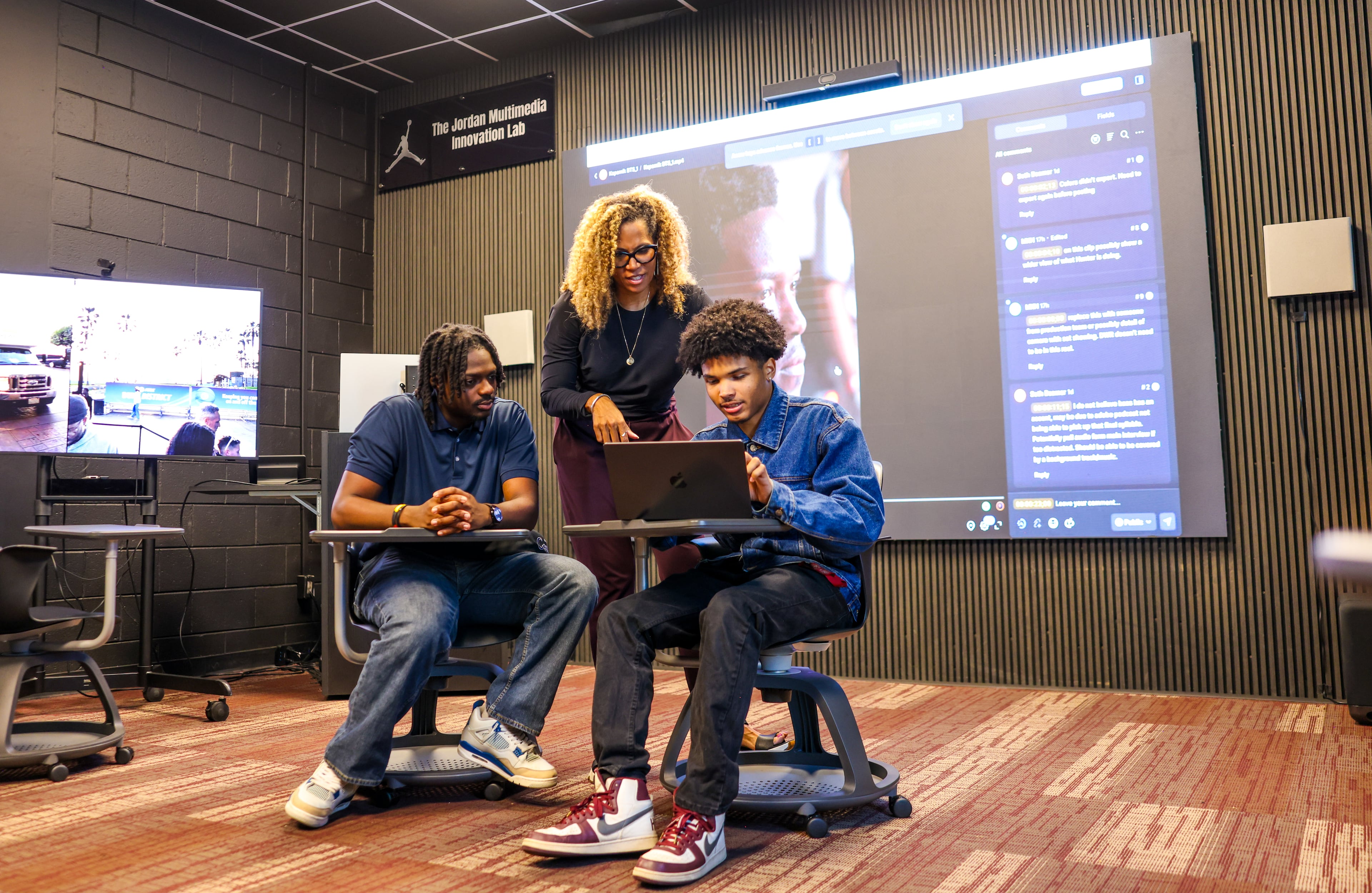 Morehouse College students and a professor in the school's new media center, which opened in September 2026. (Courtesy of Morehouse College)