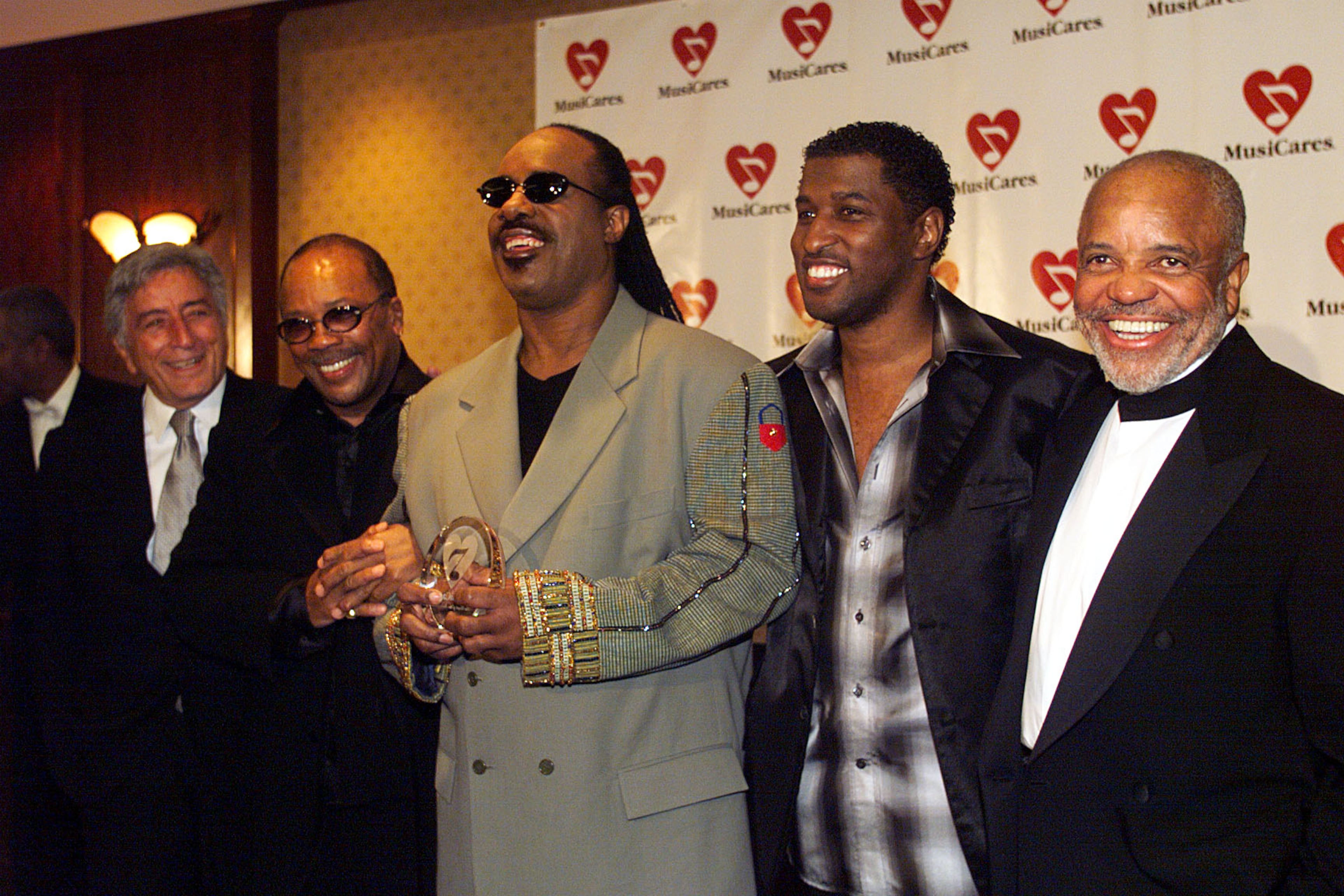 Tony Bennett, Quincy Jones, Stevie Wonder, Kenneth "Babyface" Edmonds, and Berry Gordy at the Musicares tribute to Wonder in Los Angeles, Ca, 2/22/99. Photo by Frank Micelotta/ImageDirect.
