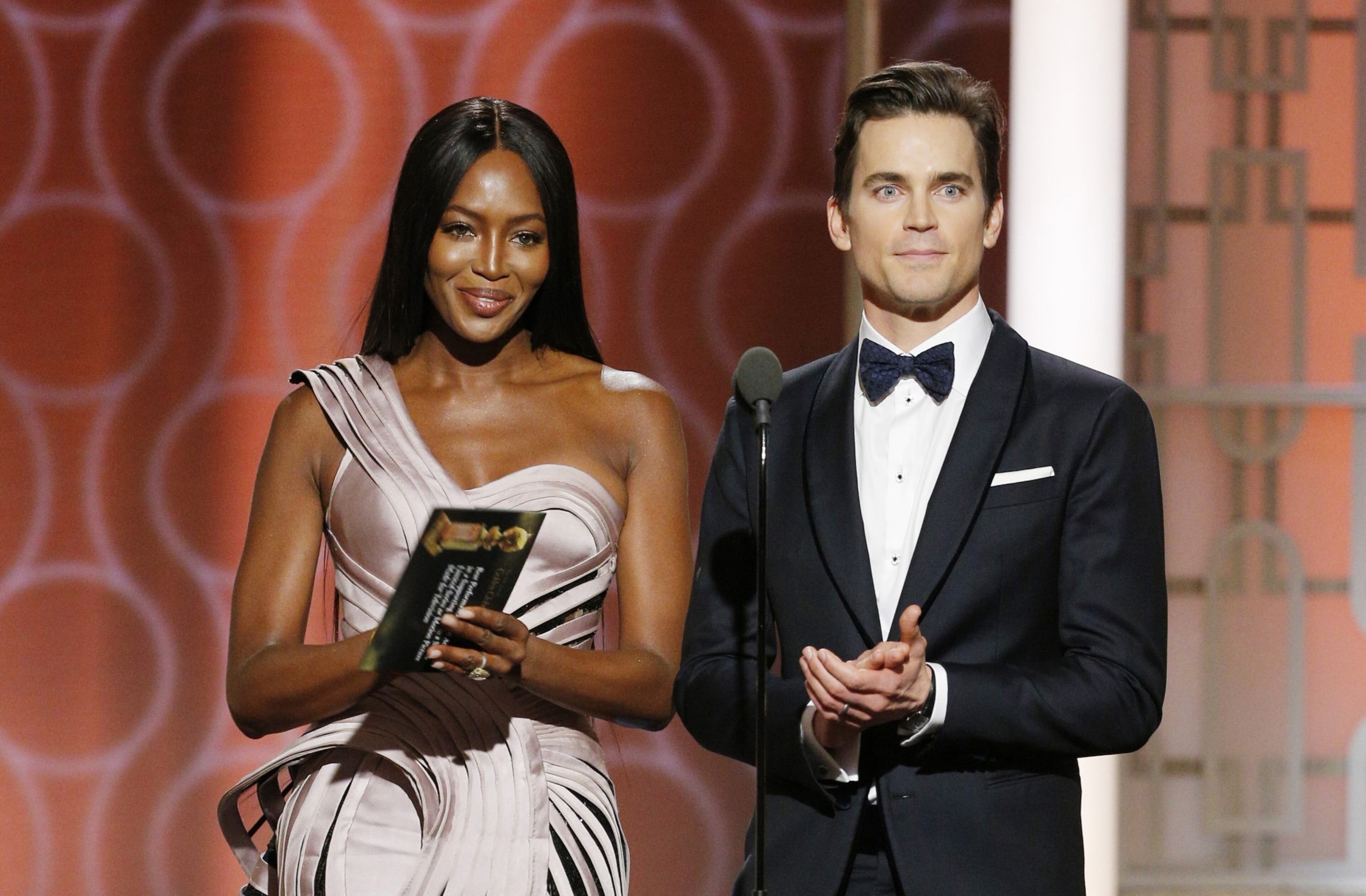 BEVERLY HILLS, CA - JANUARY 08: In this handout photo provided by NBCUniversal, presenters Naomi Campbell (L) and Matt Bomer onstage during the 74th Annual Golden Globe Awards at The Beverly Hilton Hotel on January 8, 2017 in Beverly Hills, California. (Photo by Paul Drinkwater/NBCUniversal via Getty Images)
