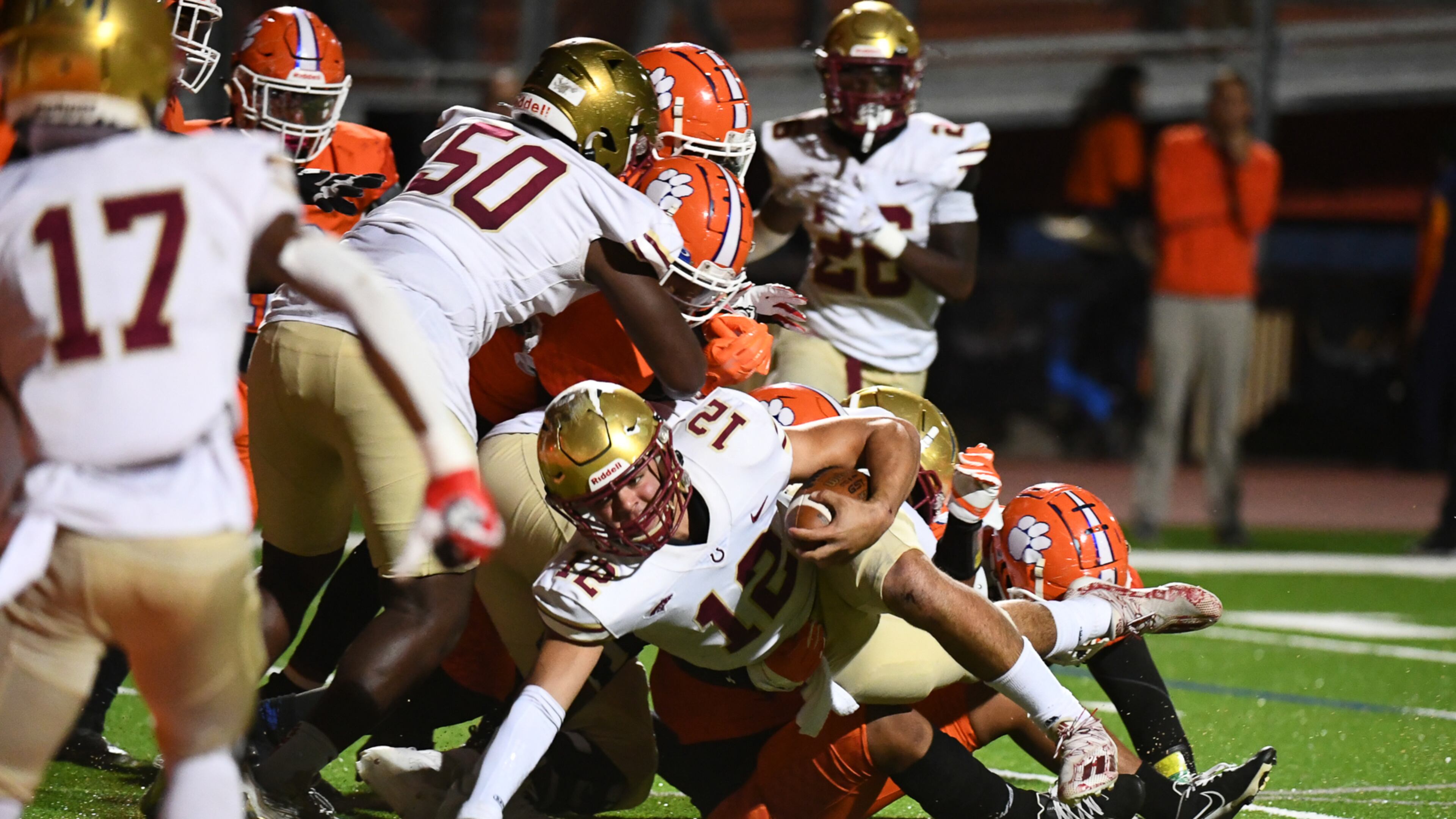 Dylan Lonergan, quarterback for Brookwood, gets tackled at the Parkview vs. Brookwood High School Football game on Friday, Oct. 28, 2022, at Parkview High School in Lilburn, Georgia. (Jamie Spaar for the Atlanta Journal Constitution)