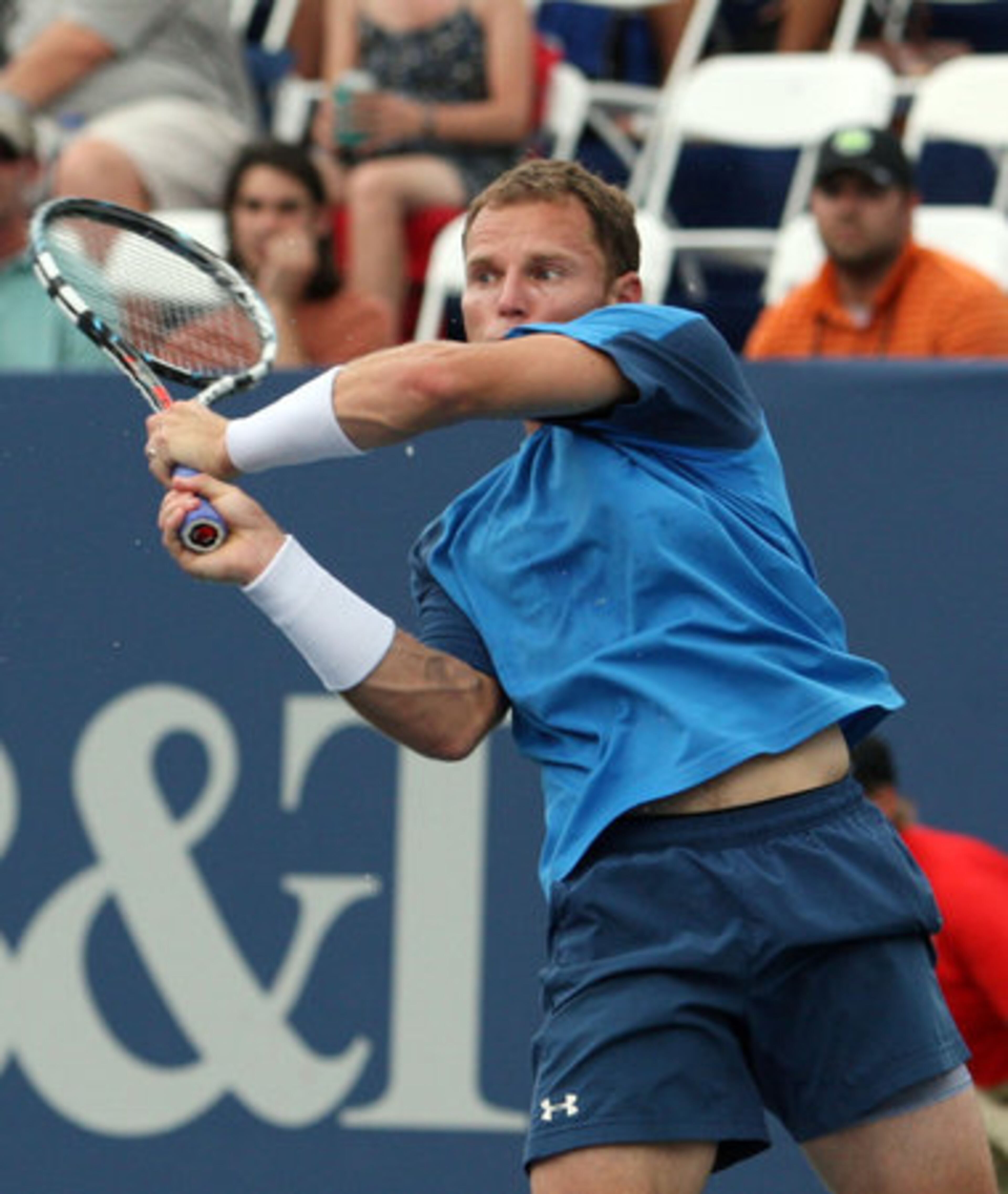 Michael Russell, of USA, follows through with a volley to Kevin Anderson, of South Africa, during their second round match of the Atlanta Open at Atlantic Station Wednesday afternoon in Atlanta, Ga., July 18, 2012.