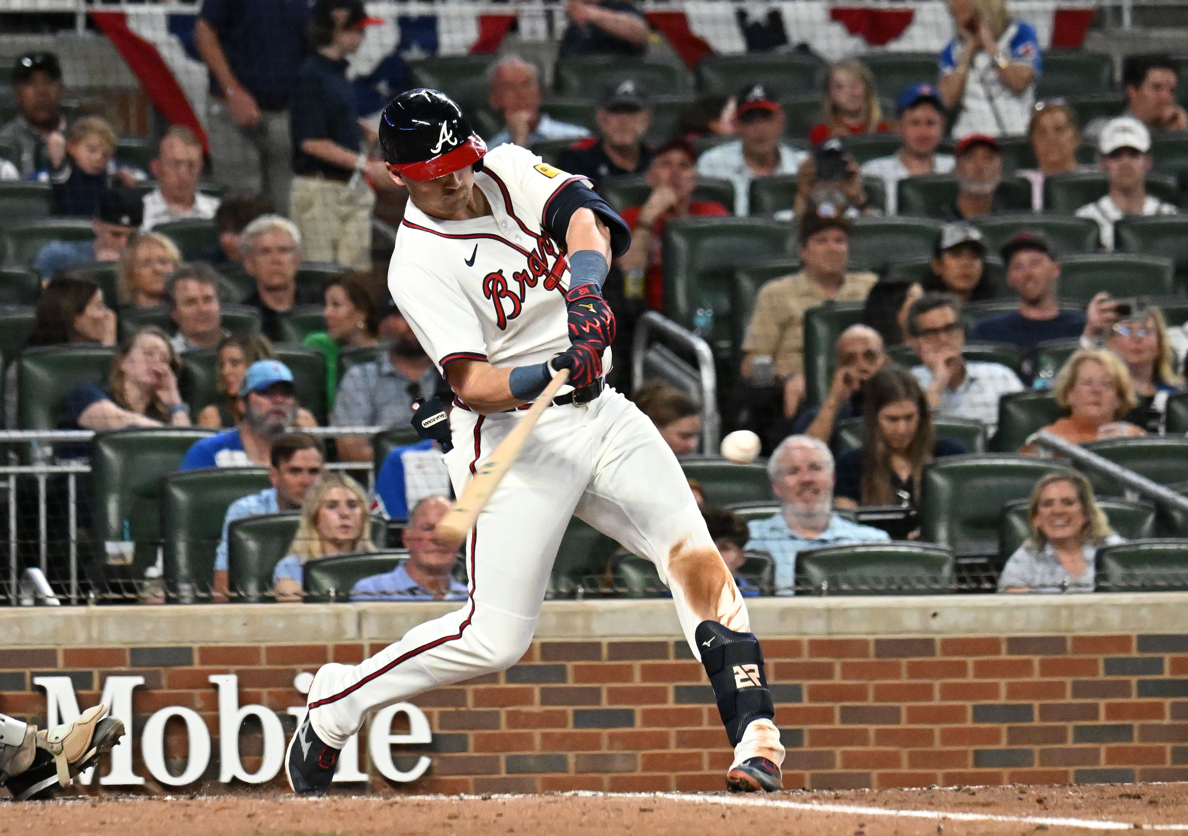 Atlanta Braves third base Austin Riley (27) hits an RBI single to score Atlanta Braves designated hitter Marcell Ozuna during the eighth inning of home opener baseball game at Truist Park, Friday, April 4, 2025, in Atlanta. Atlanta Braves won 10-0 over Miami Marlins. (Hyosub Shin / AJC)