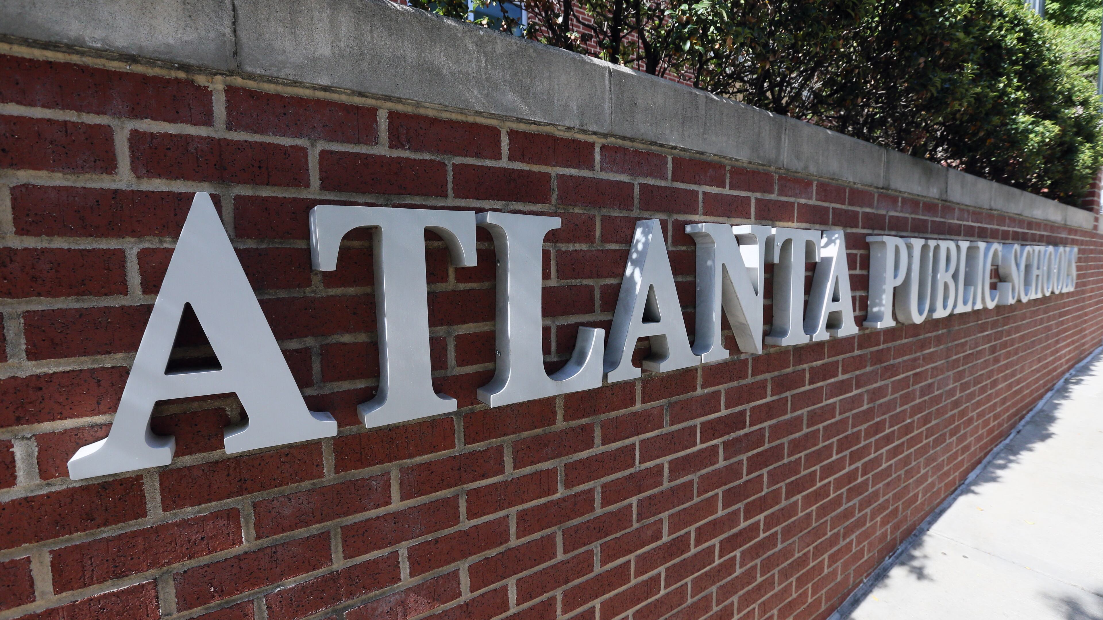 Atlanta Public Schools still lags behind statewide averages but 56 of its schools increased state report card scores. BOB ANDRES /BANDRES@AJC.COM