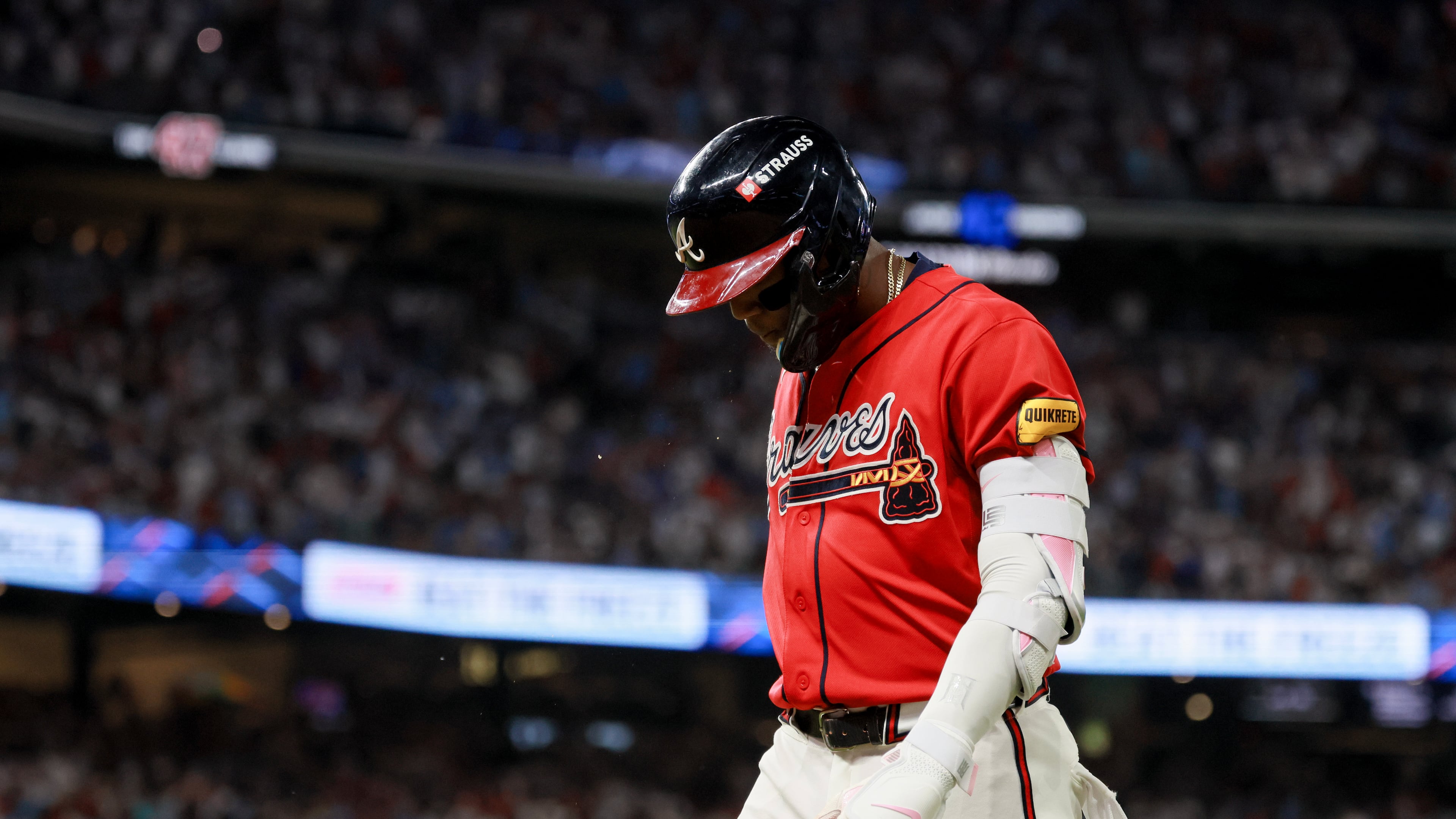 Atlanta Braves designated hitter Ronald Acuña Jr. walks to the dugout after grounding out against the Los Angeles Dodgers to end a scoring threat during the fifth inning of Game 3 of the MLB National League Division Series between the Atlanta Braves and the Los Angeles Dodgers, Tuesday, Oct. 6, 2026, in Atlanta. (Jason Getz/AJC)