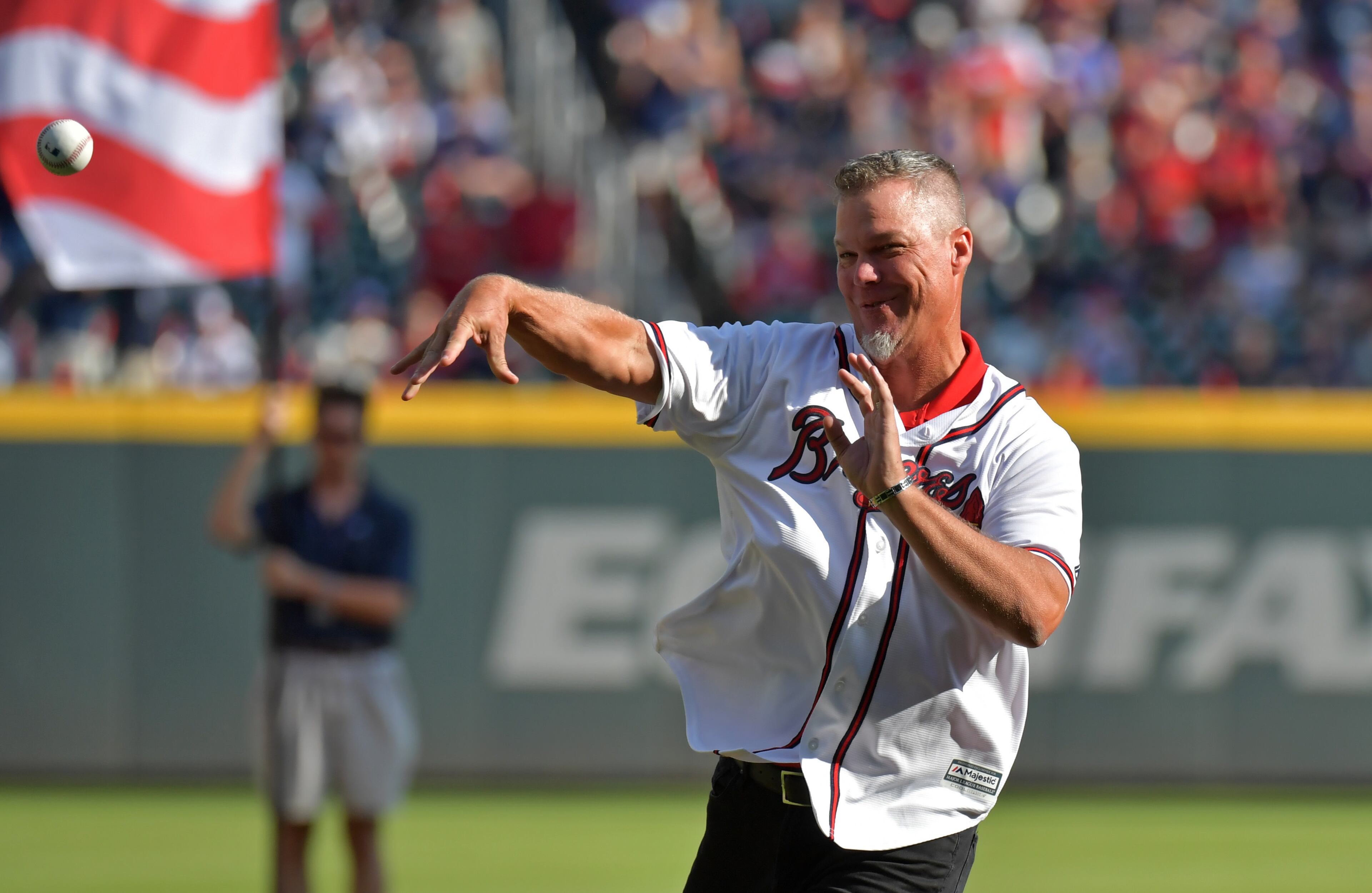 Former Atlanta Braves third baseman Chipper Jones throws out the ceremonial pitch before their game against the St. Louis Cardinals in Game 1 of the best-of-five National League Division Series at SunTrust Park on Thursday, October 3, 2019. (Hyosub Shin / Hyosub.Shin@ajc.com)
