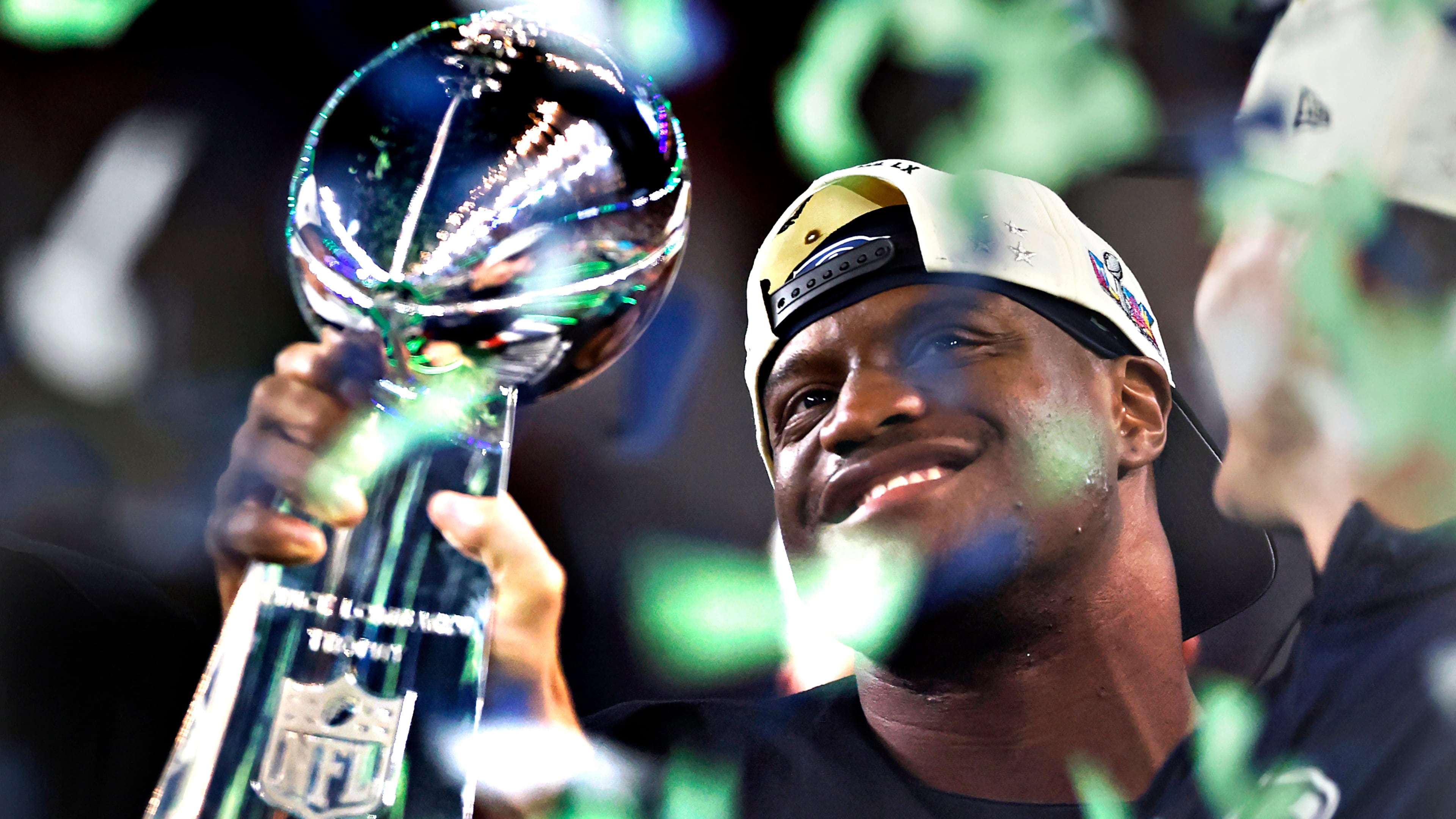 Seattle Seahawks running back Kenneth Walker III holds the Lombardi trophy after the Seahawks defeated the New England Patriots in the Super Bowl 60 in Santa Clara, Calif., Sunday, Feb. 8, 2026. (Scott Strazzante/San Francisco Chronicle via AP)