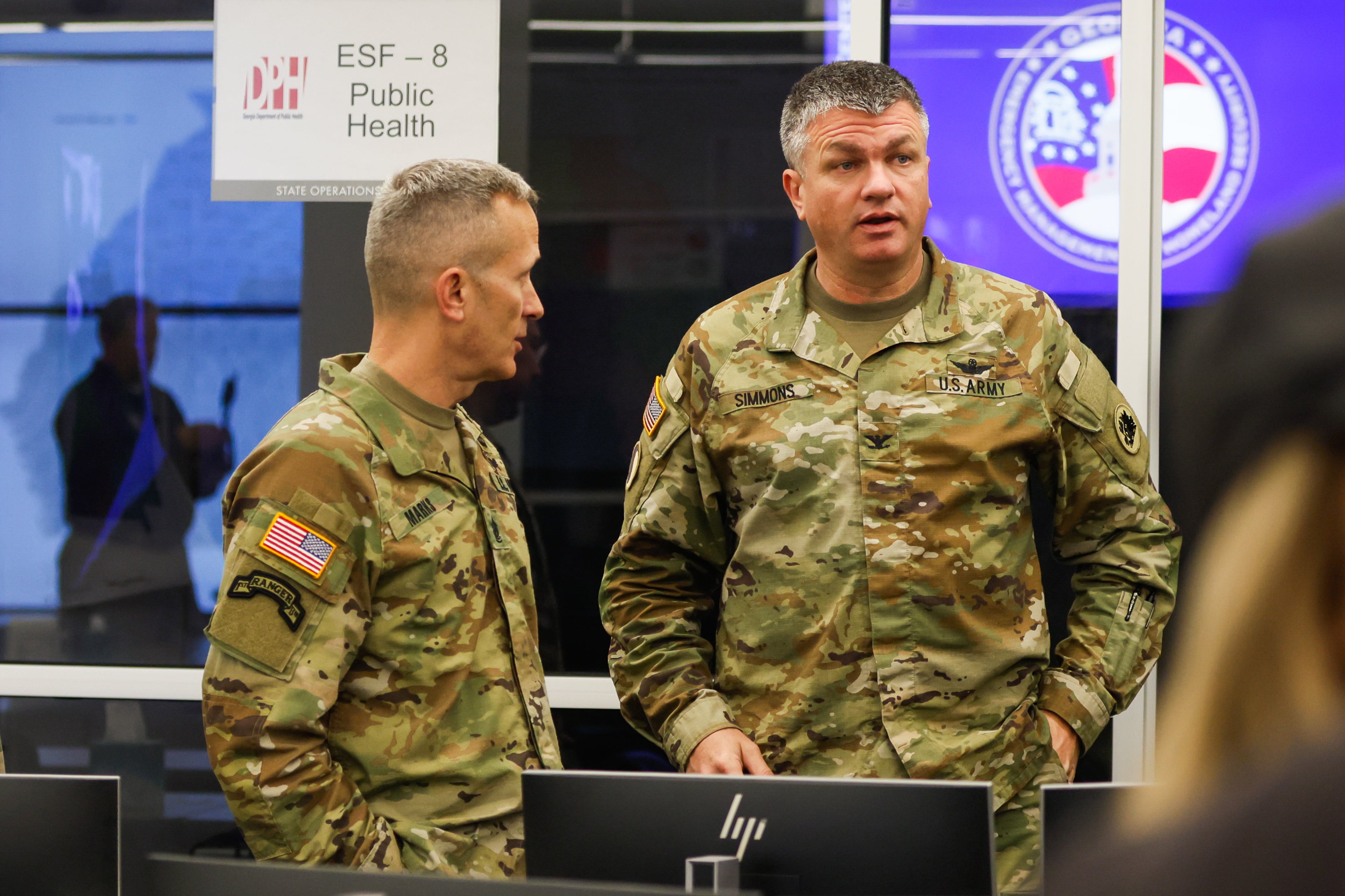 People watch before a press conference at the Georgia Emergency Management Agency State Operations Center in Atlanta on Saturday, Jan. 24, 2026. (Abbey Cutrer/AJC)