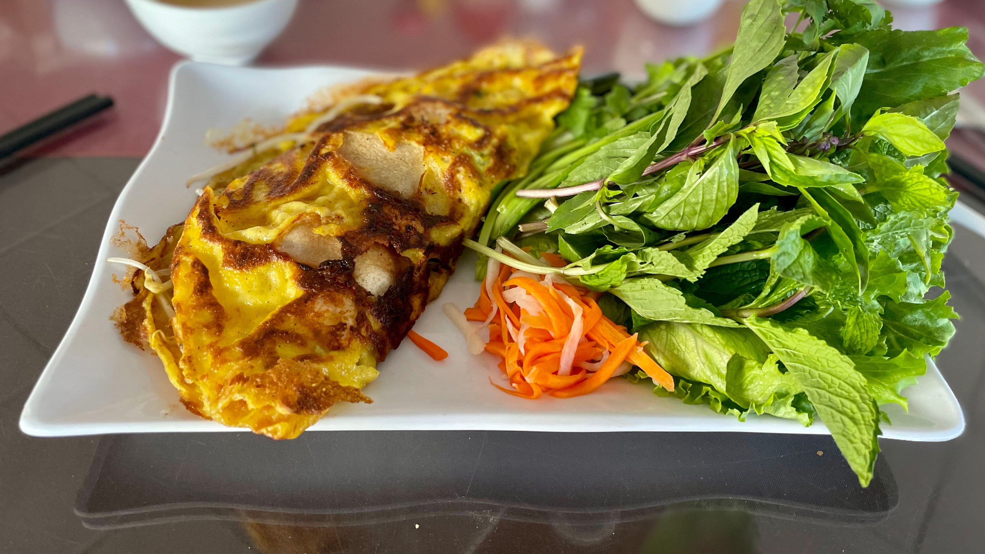 Bánh xèo, featured on the menu at Nam Phuong Buford Highway, is a popular Vietnamese street food. Angela Hansberger for The Atlanta Journal-Constitution