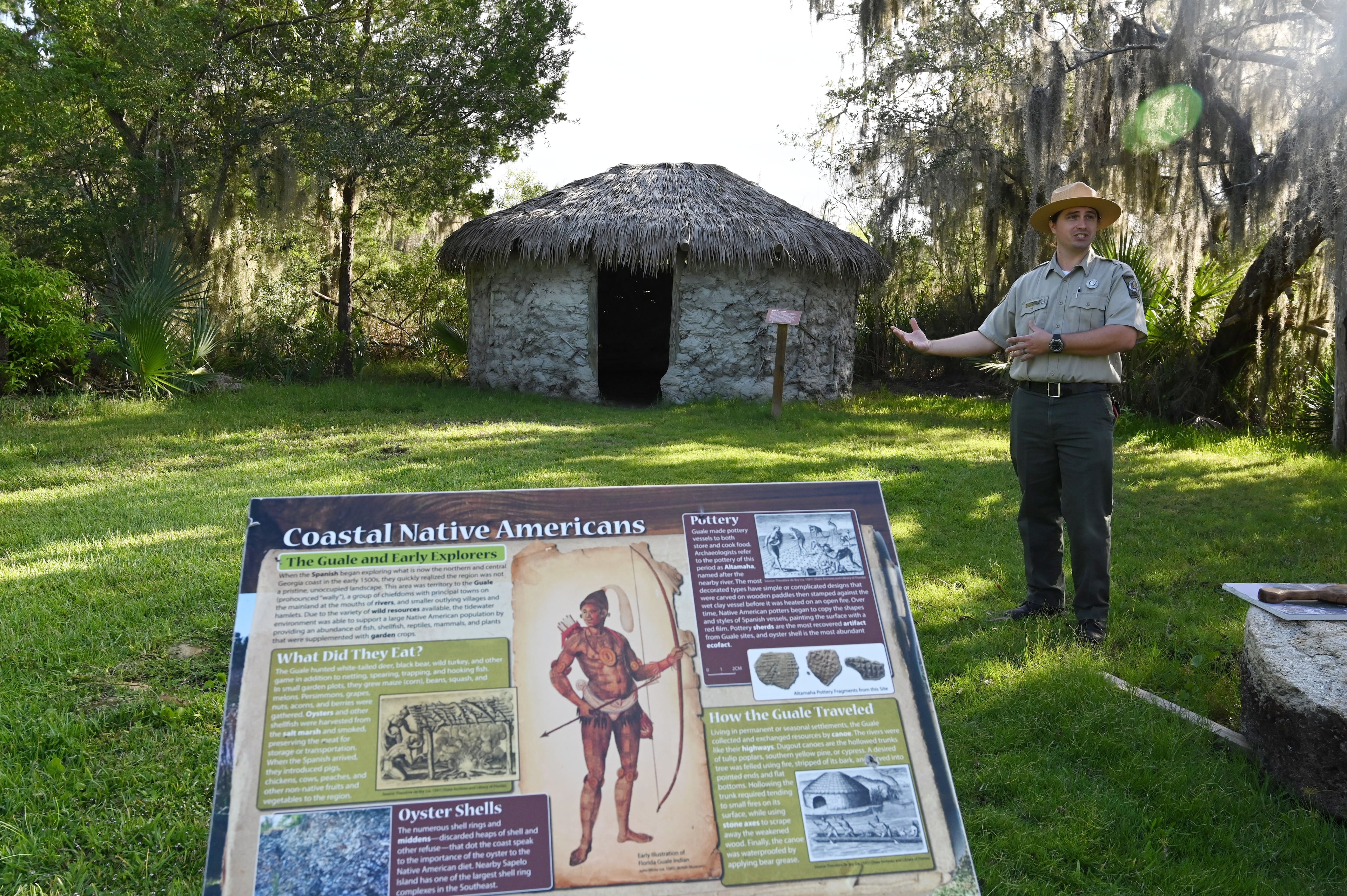 Michael Putman, site manager at Fort King George State Historic Site, discusses the history of the Guale people and the Spanish missions along Georgia's coast. Guale families lived in circular-shaped, wattle-and-daub houses with thatch roofs. (Hyosub Shin/AJC)